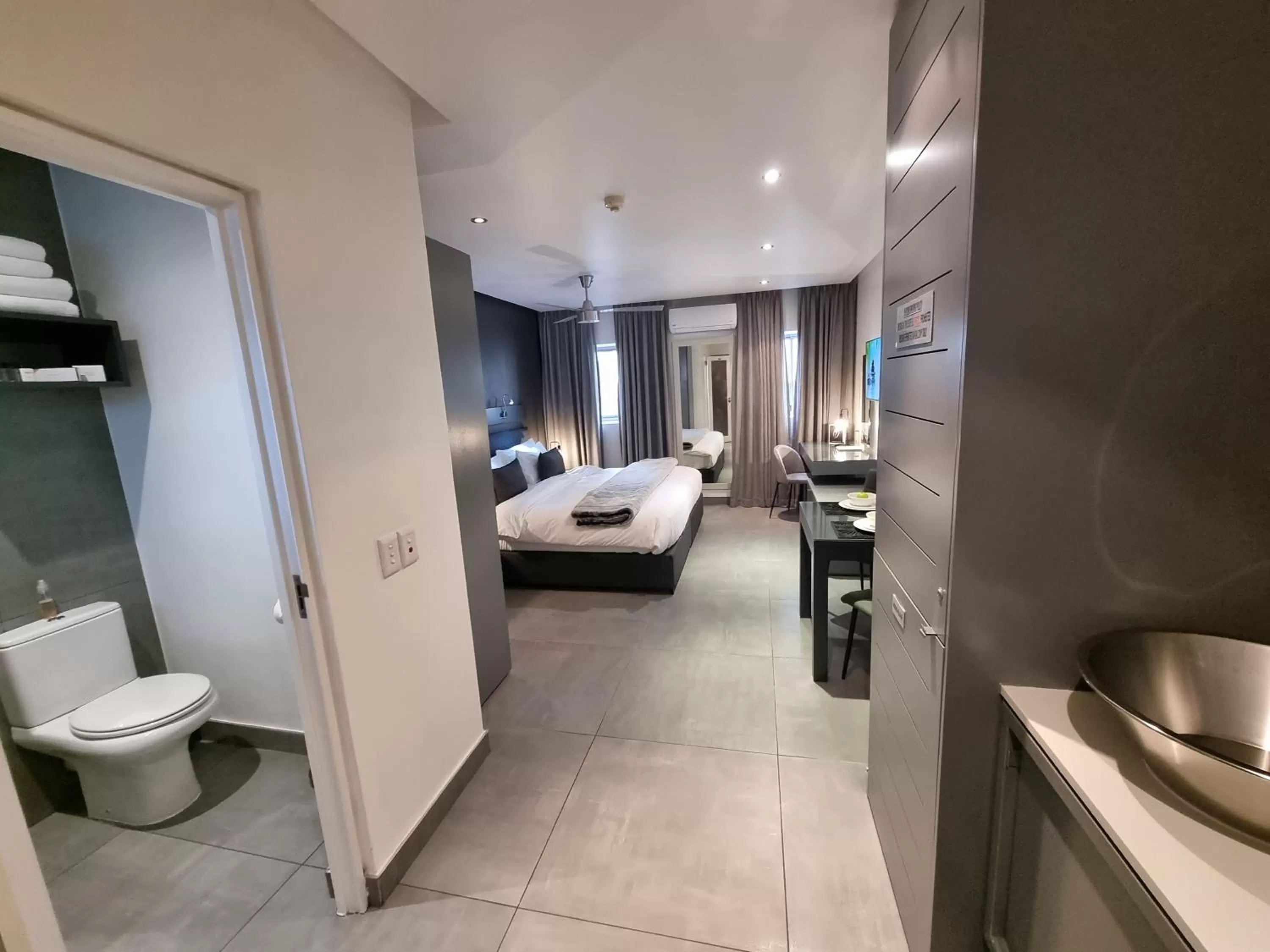 Bed in Atlantic Affair Boutique Hotel