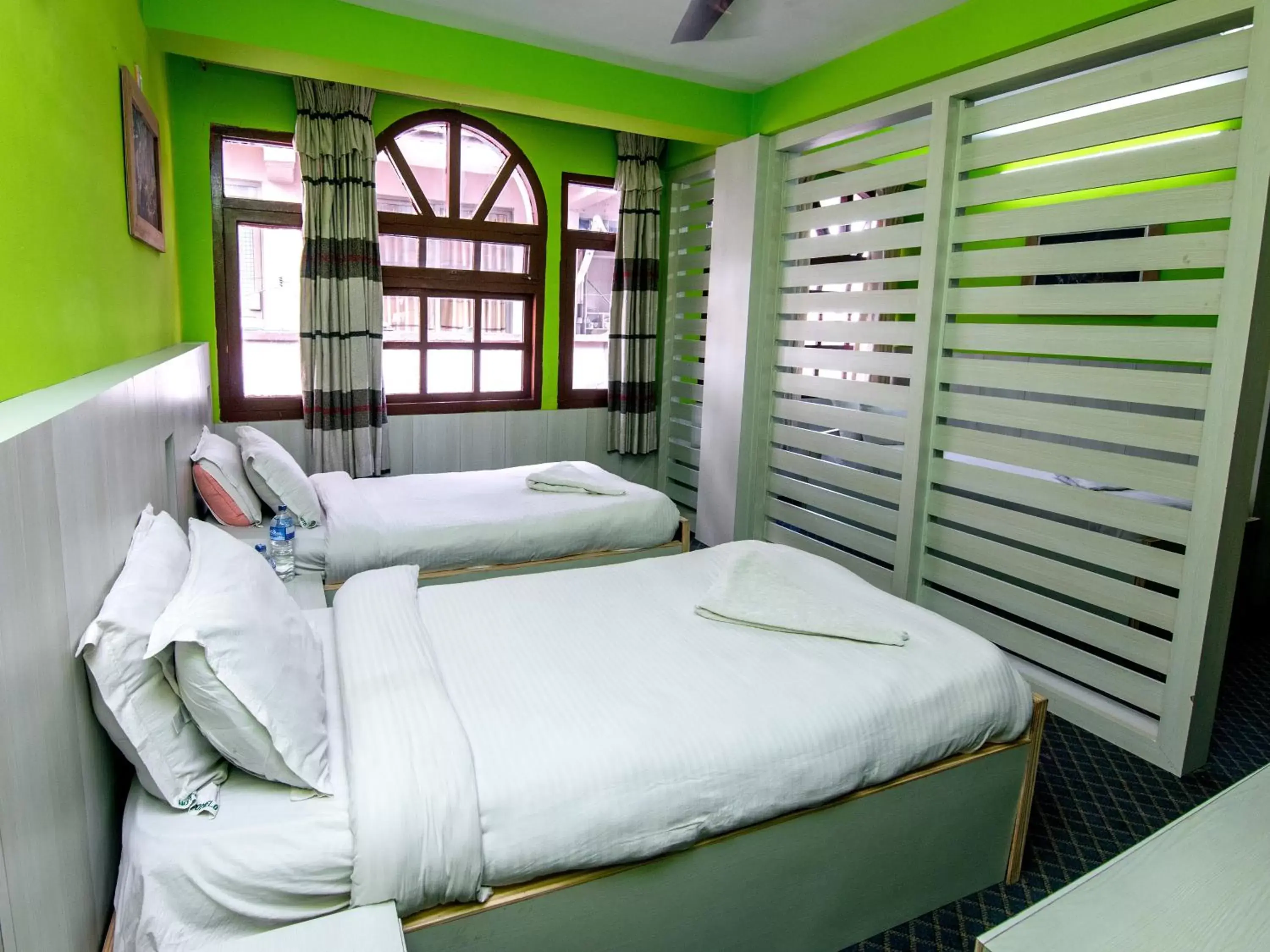 Bed in Hotel Pomelo House