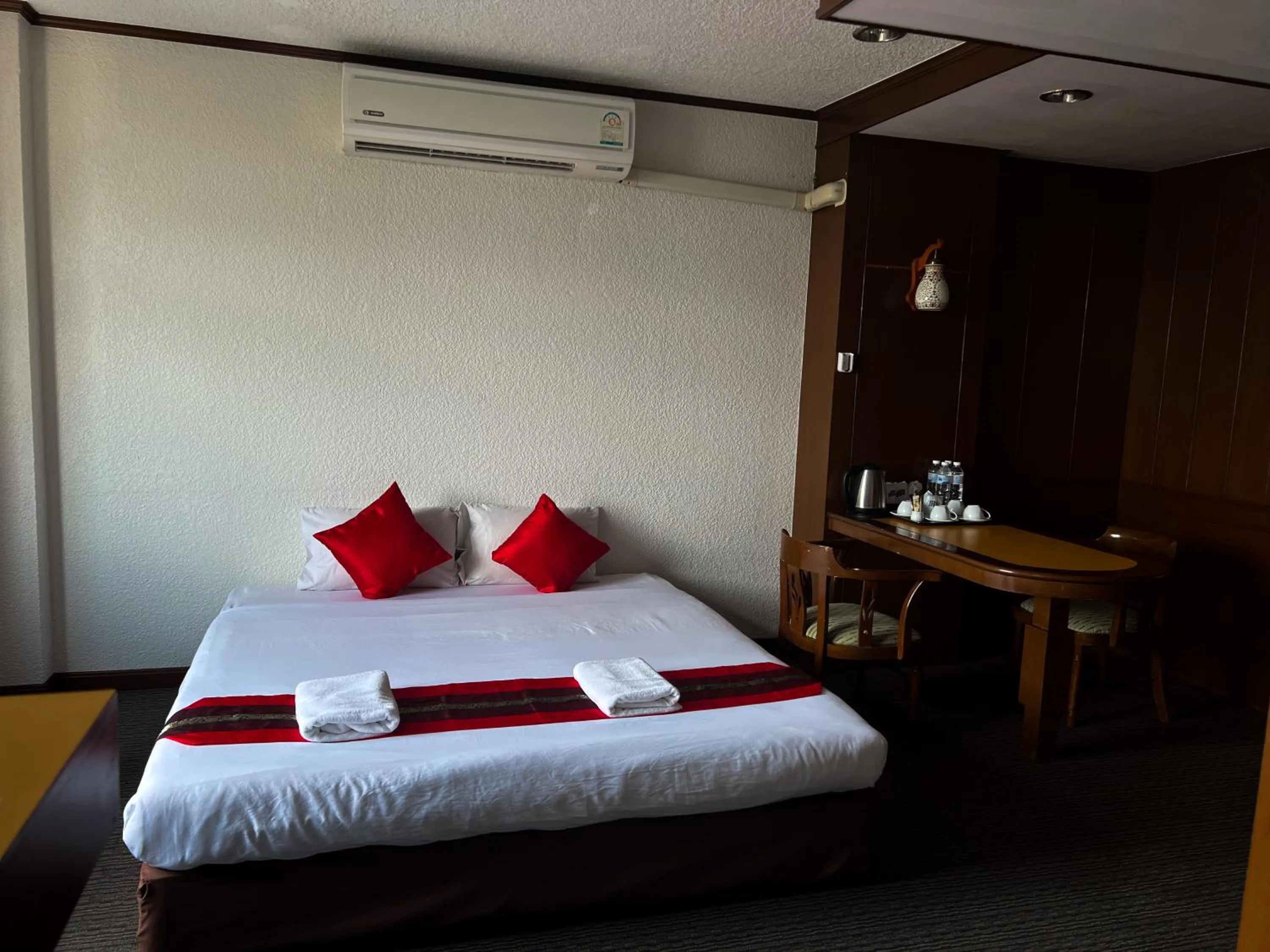 Bed in River Grand Hotel