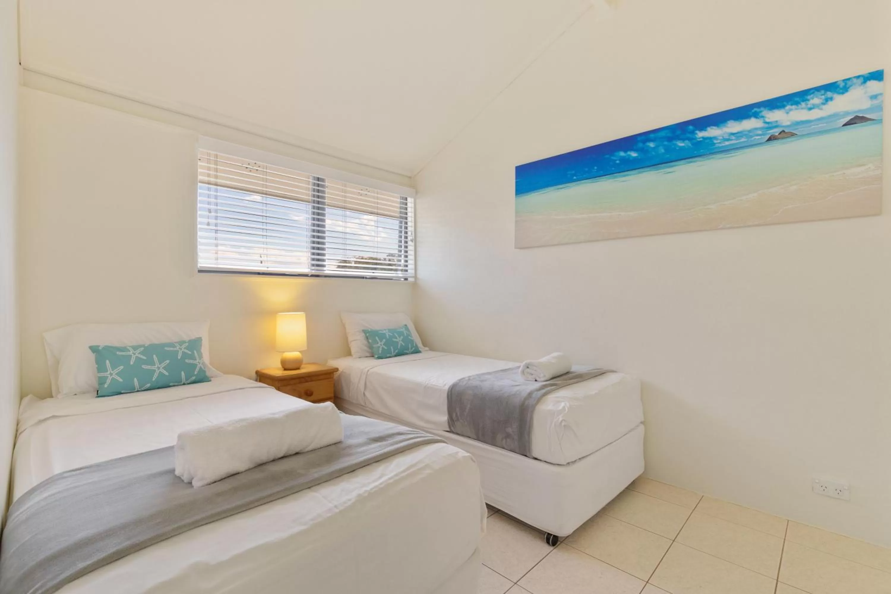 Bed in Glen Eden Beach Resort