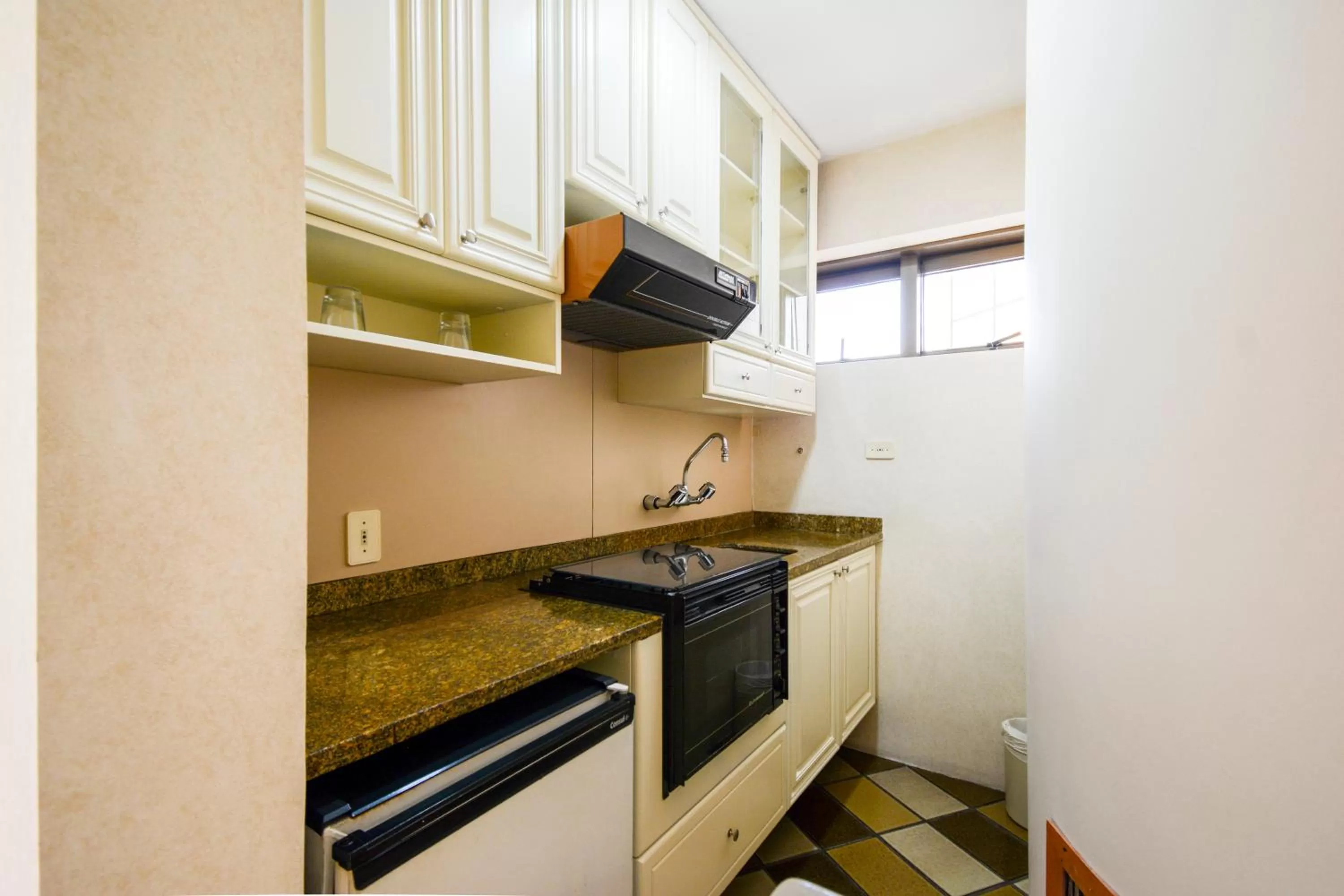 Kitchen or kitchenette, Kitchen/Kitchenette in Wall Street Apartments by BnbHost