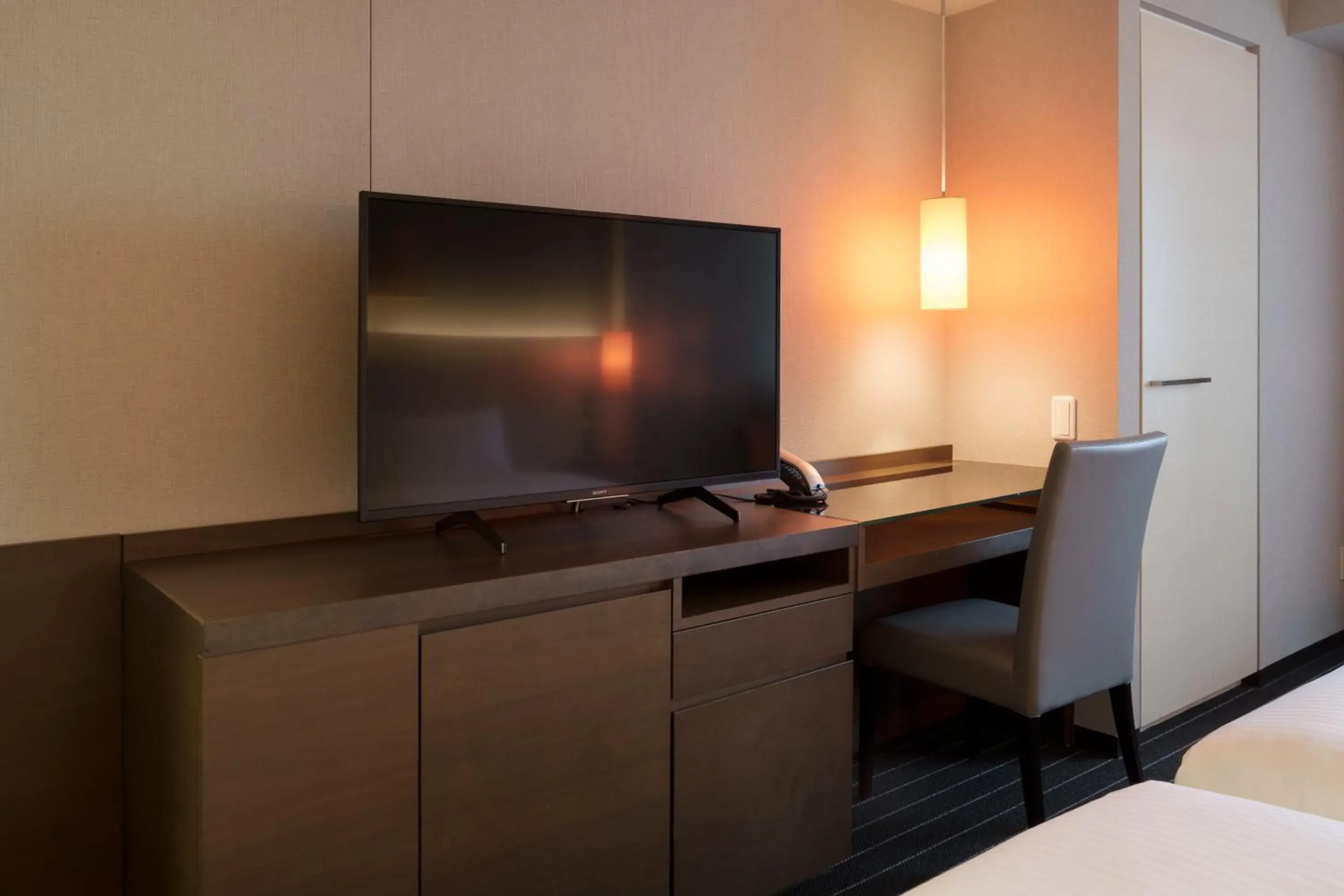 TV and multimedia, TV/Entertainment Center in Hotel Forza Oita