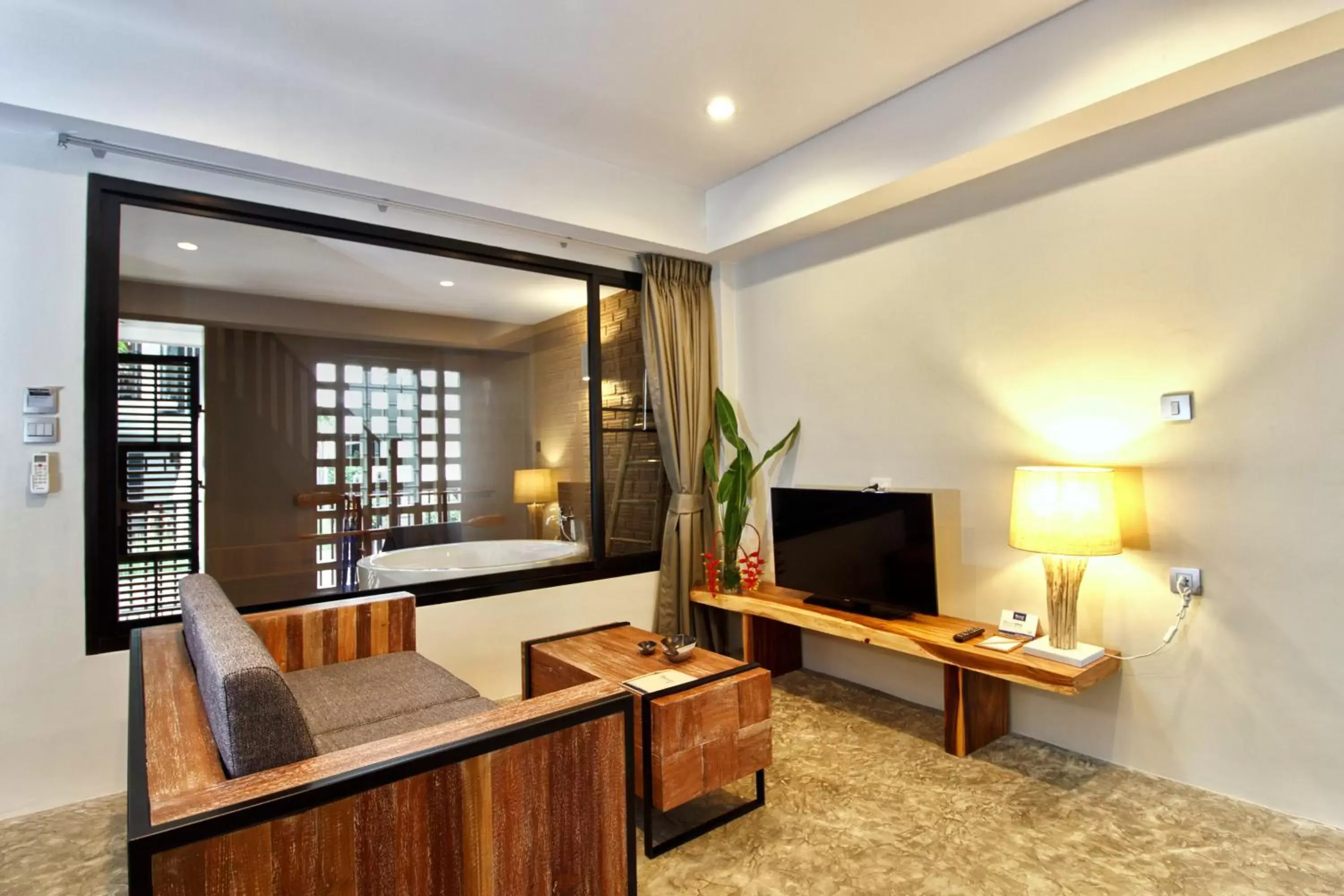 Living room, TV/Entertainment Center in Deevana Krabi Resort - SHA Extra Plus