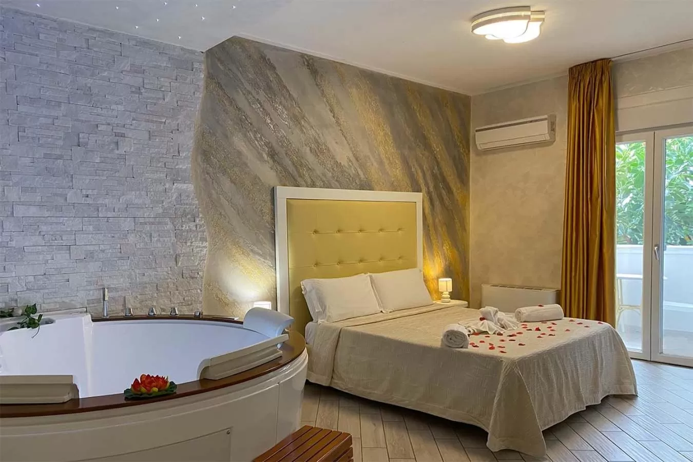 Photo of the whole room, Bed in BlueBay Residence Resort