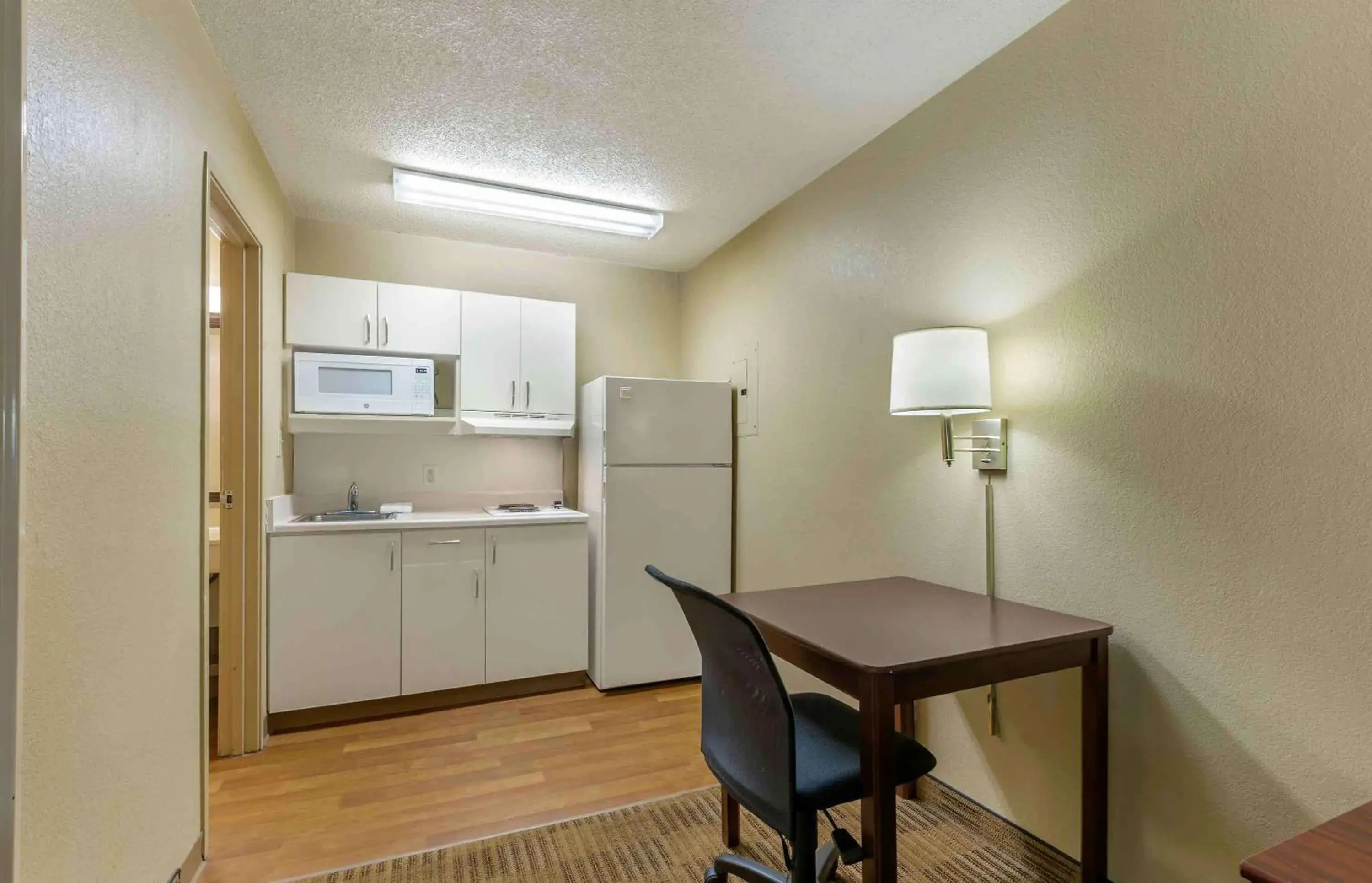 Bedroom, Kitchen/Kitchenette in Extended Stay America Suites - Greensboro - Wendover Ave - Big Tree Way