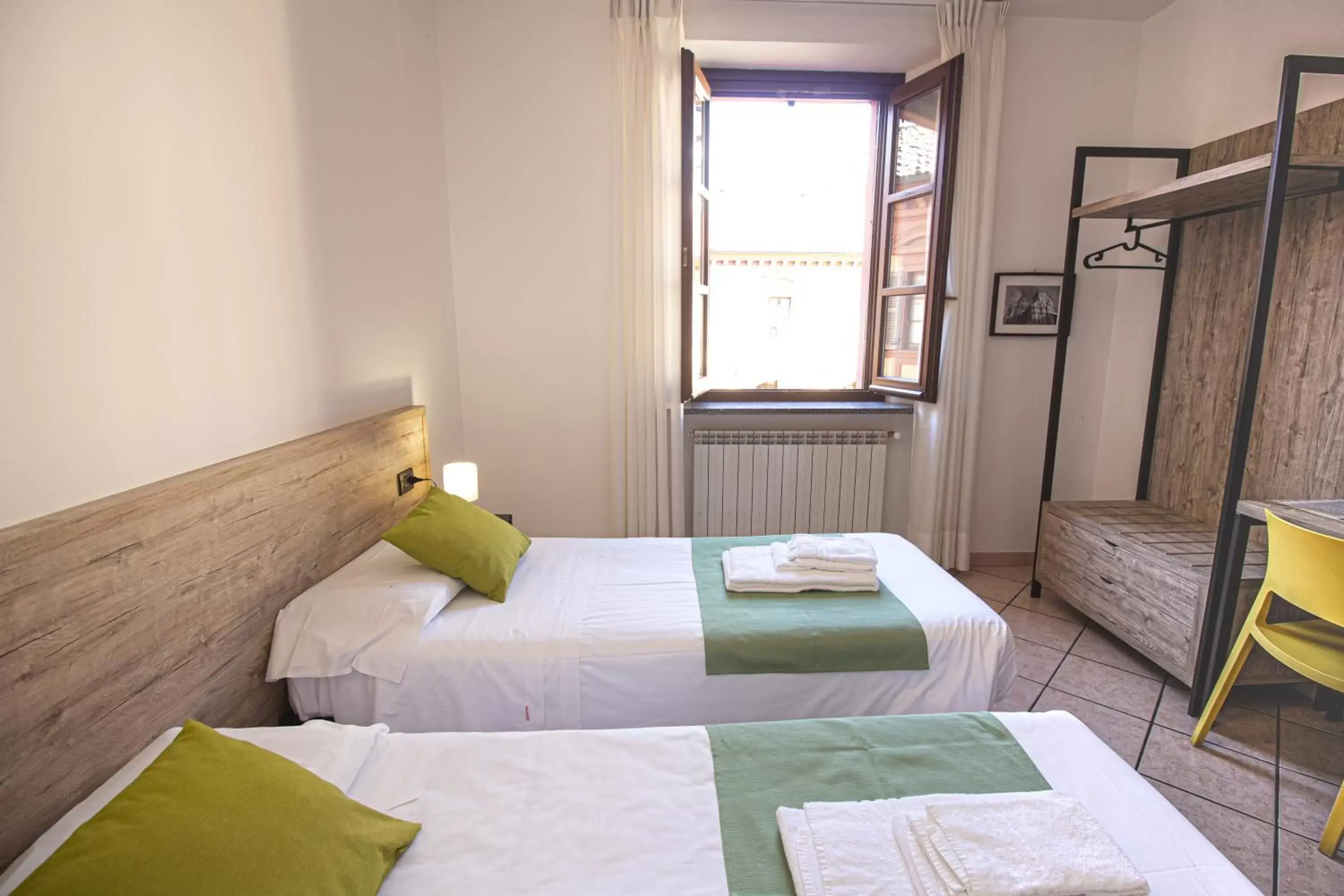 Bedroom, Bed in Hotel Tornielli 9