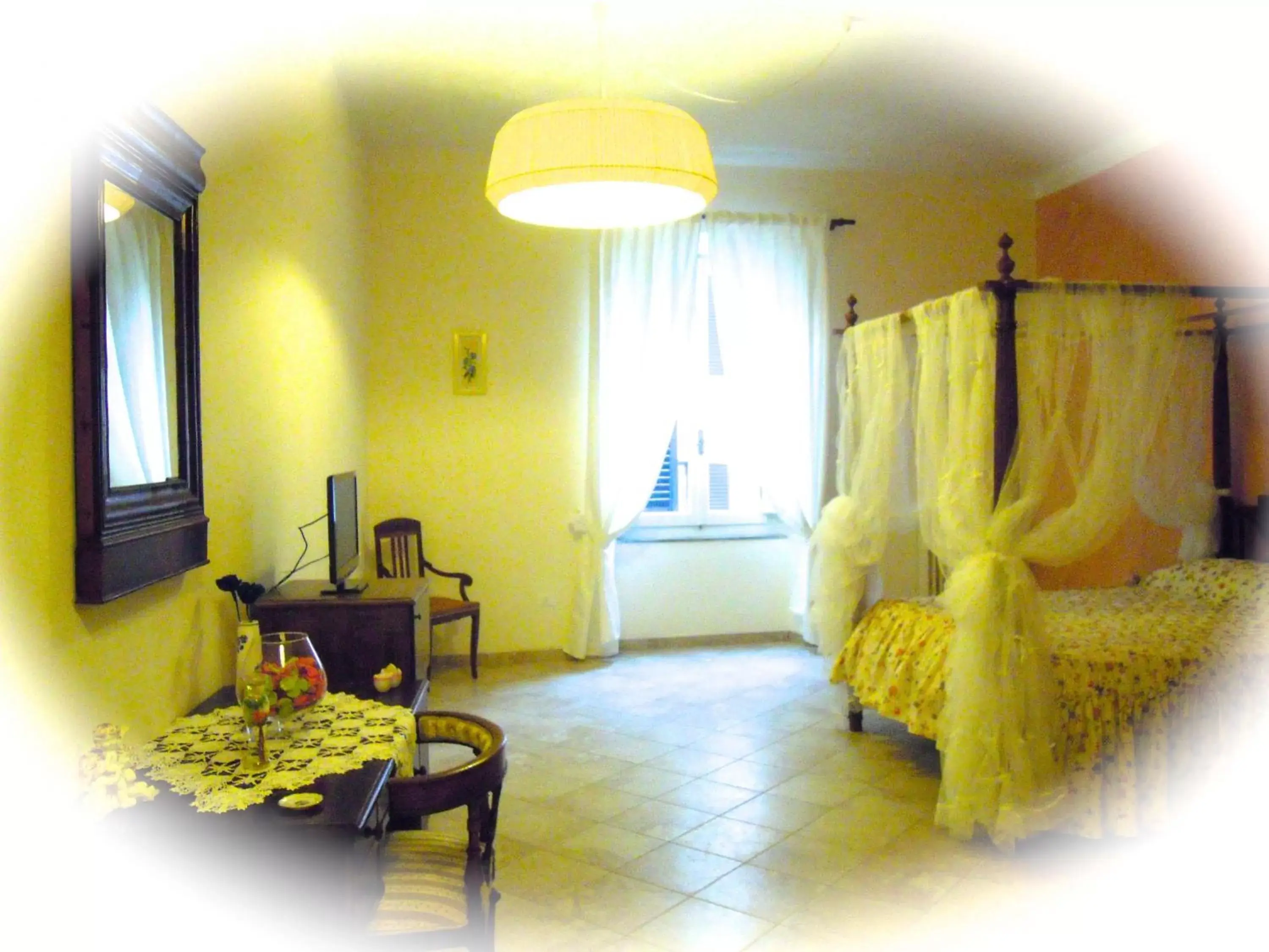 Bedroom, Seating Area in Locanda dei Fiori
