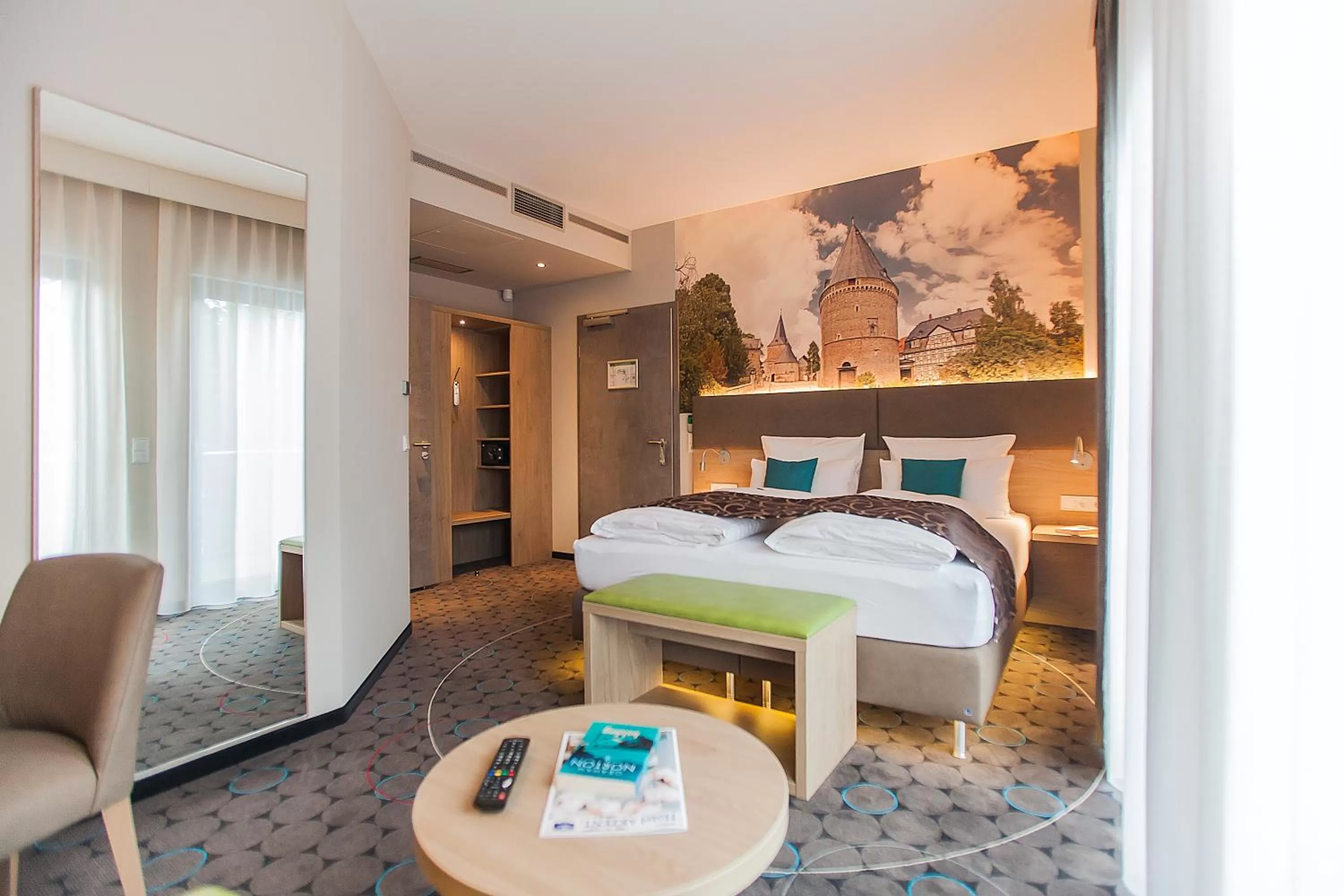 Photo of the whole room, Bed in AKZENT Hotel Villa Saxer