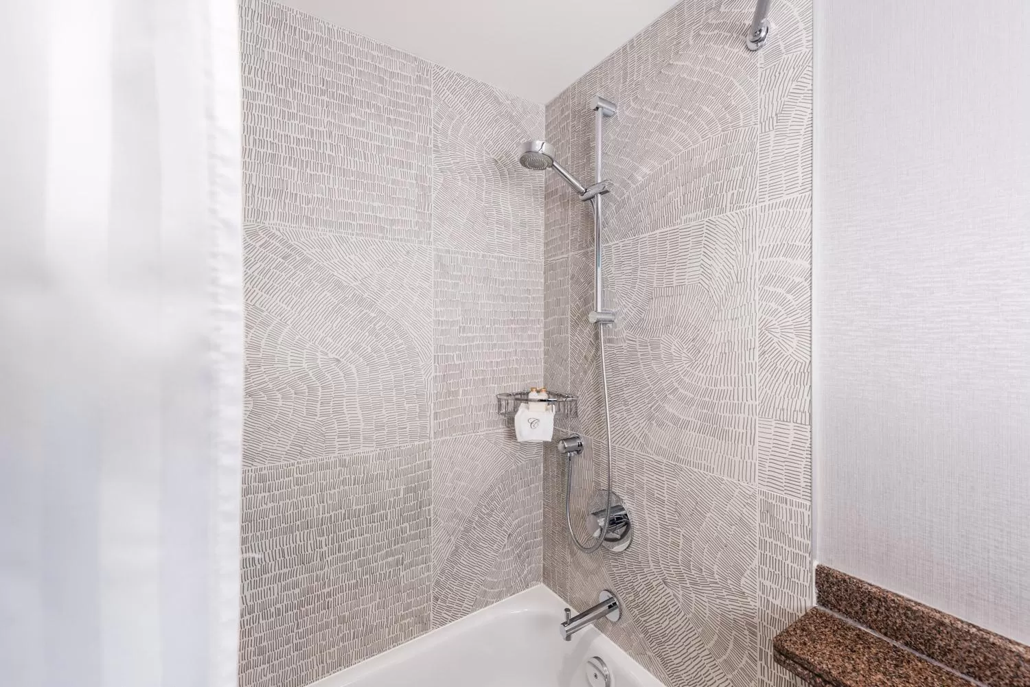 Bathroom in Carmana Hotel & Suites