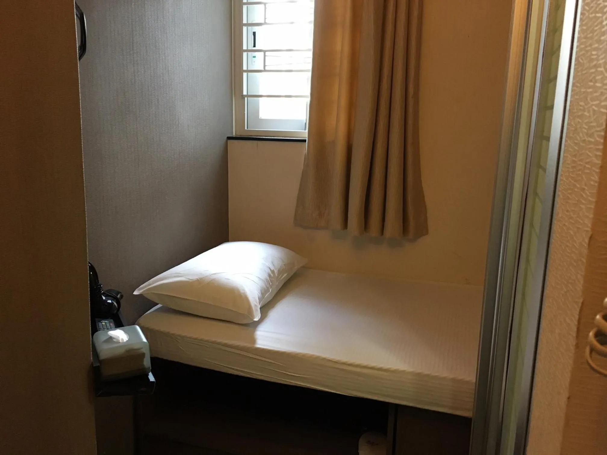 Photo of the whole room, Bed in Homy Inn North Point