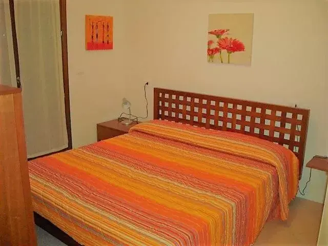 Bedroom, Bed in Villaggio dei Fiori Apart- Hotel 3 Stars - Family Resort