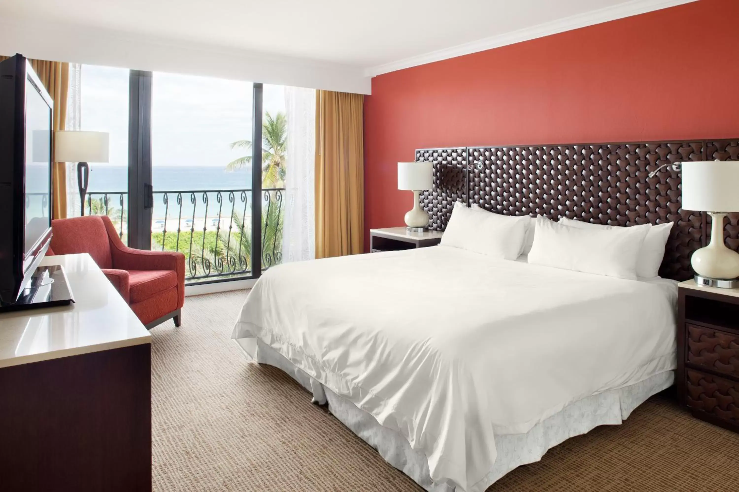 Bed in Opal Grand Oceanfront Resort & Spa