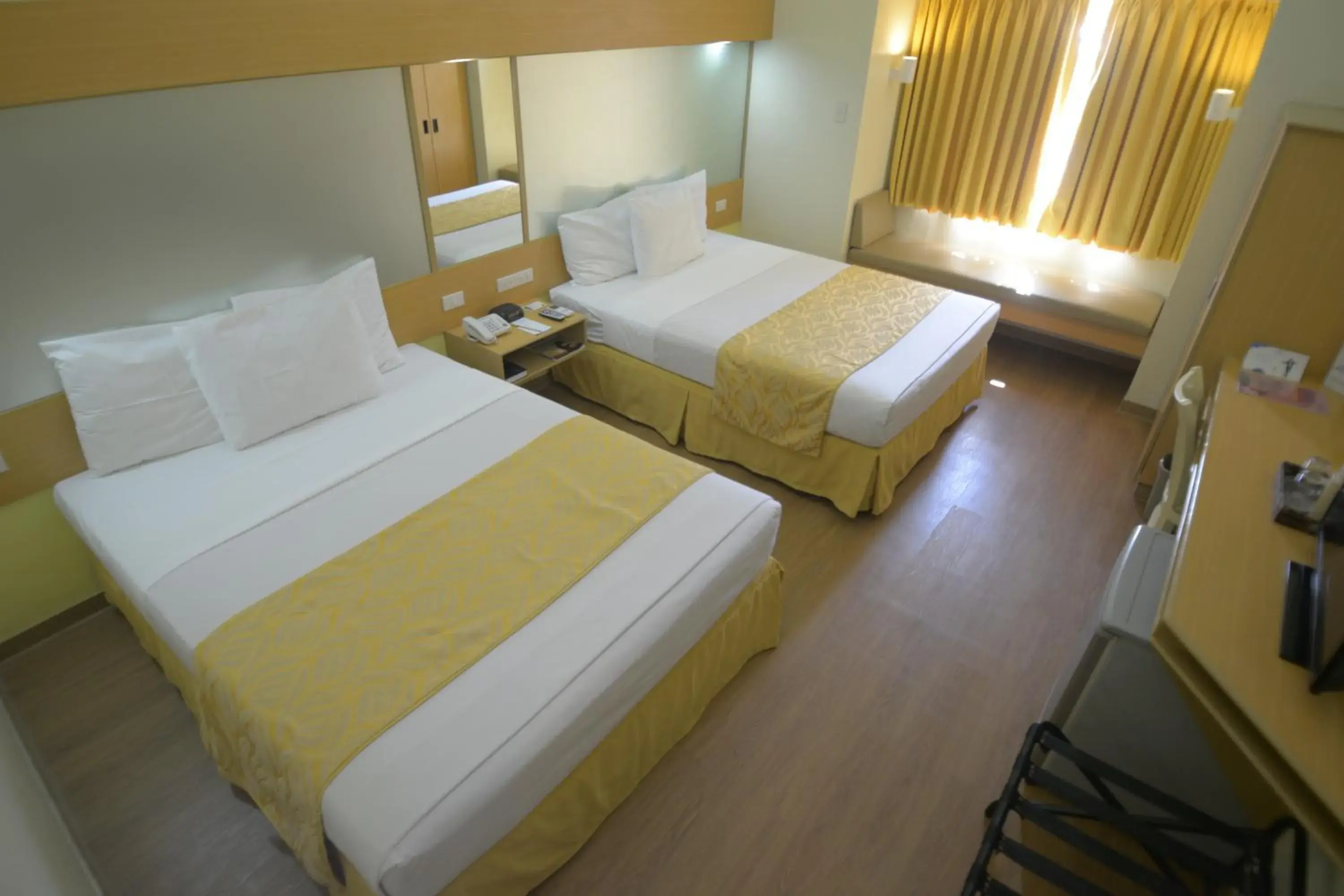 Photo of the whole room, Bed in Microtel by Wyndham Davao
