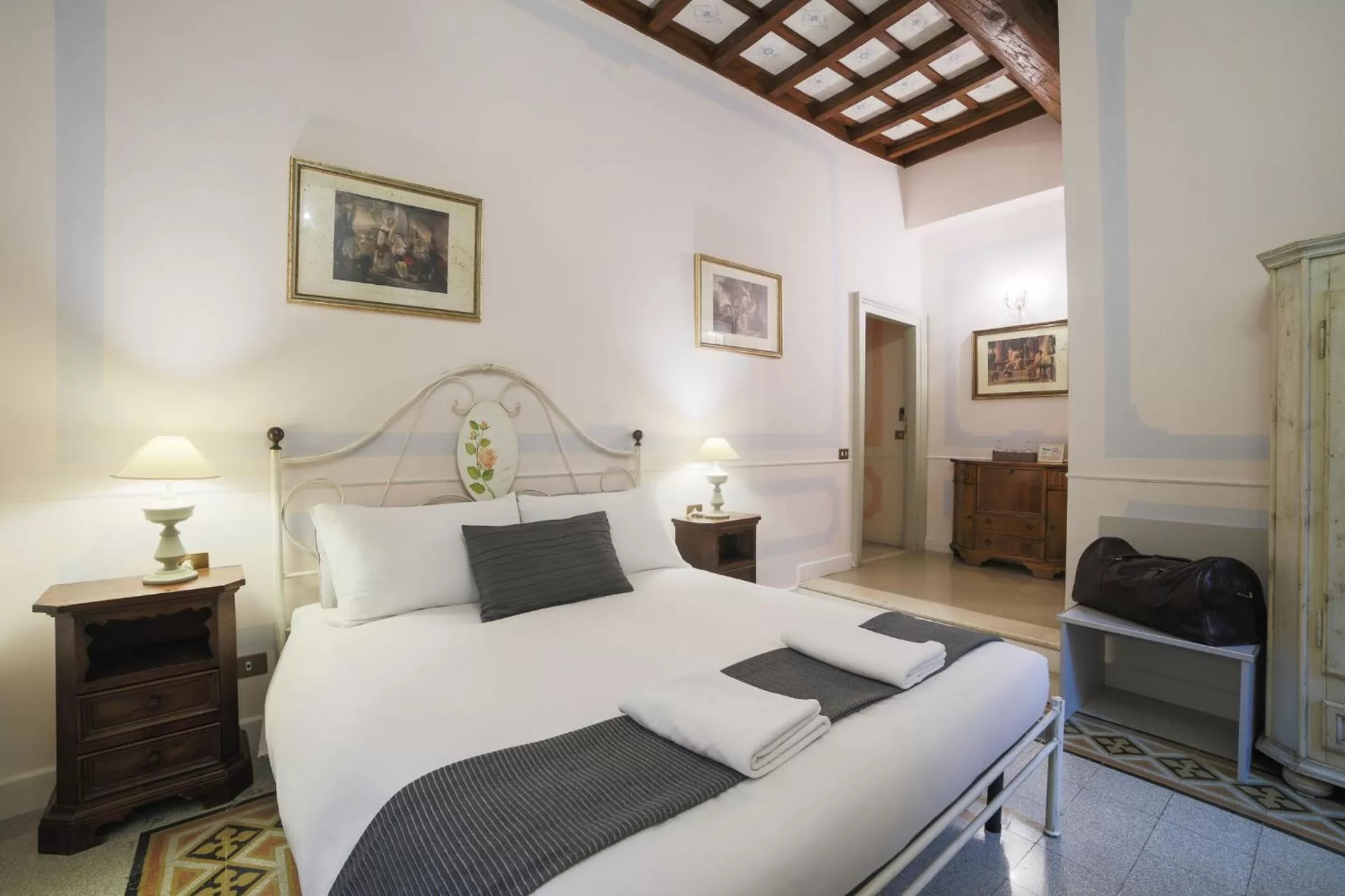 Photo of the whole room, Bed in La Maison Dell'Orologio