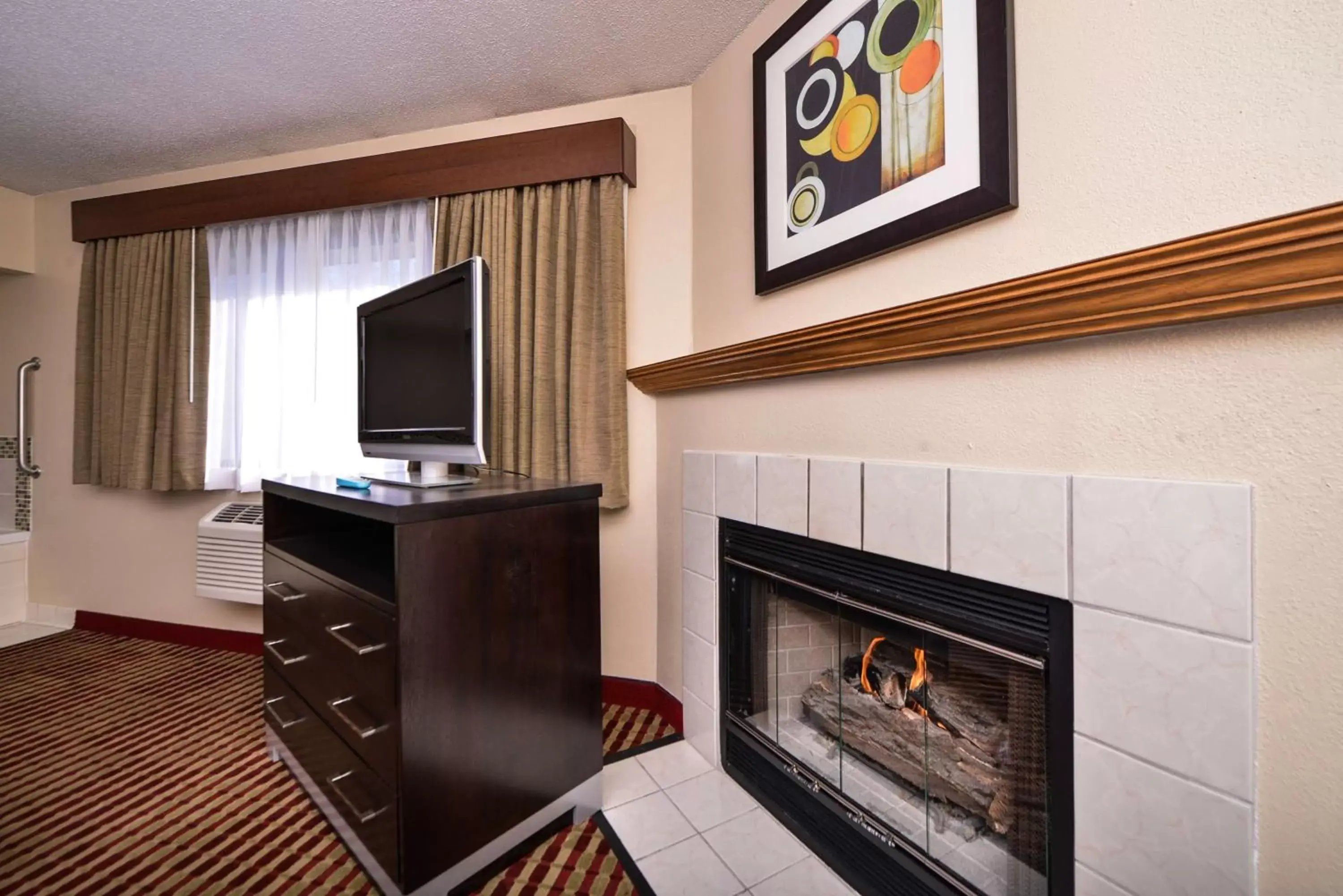 Photo of the whole room, TV/Entertainment Center in Best Western Germantown Inn