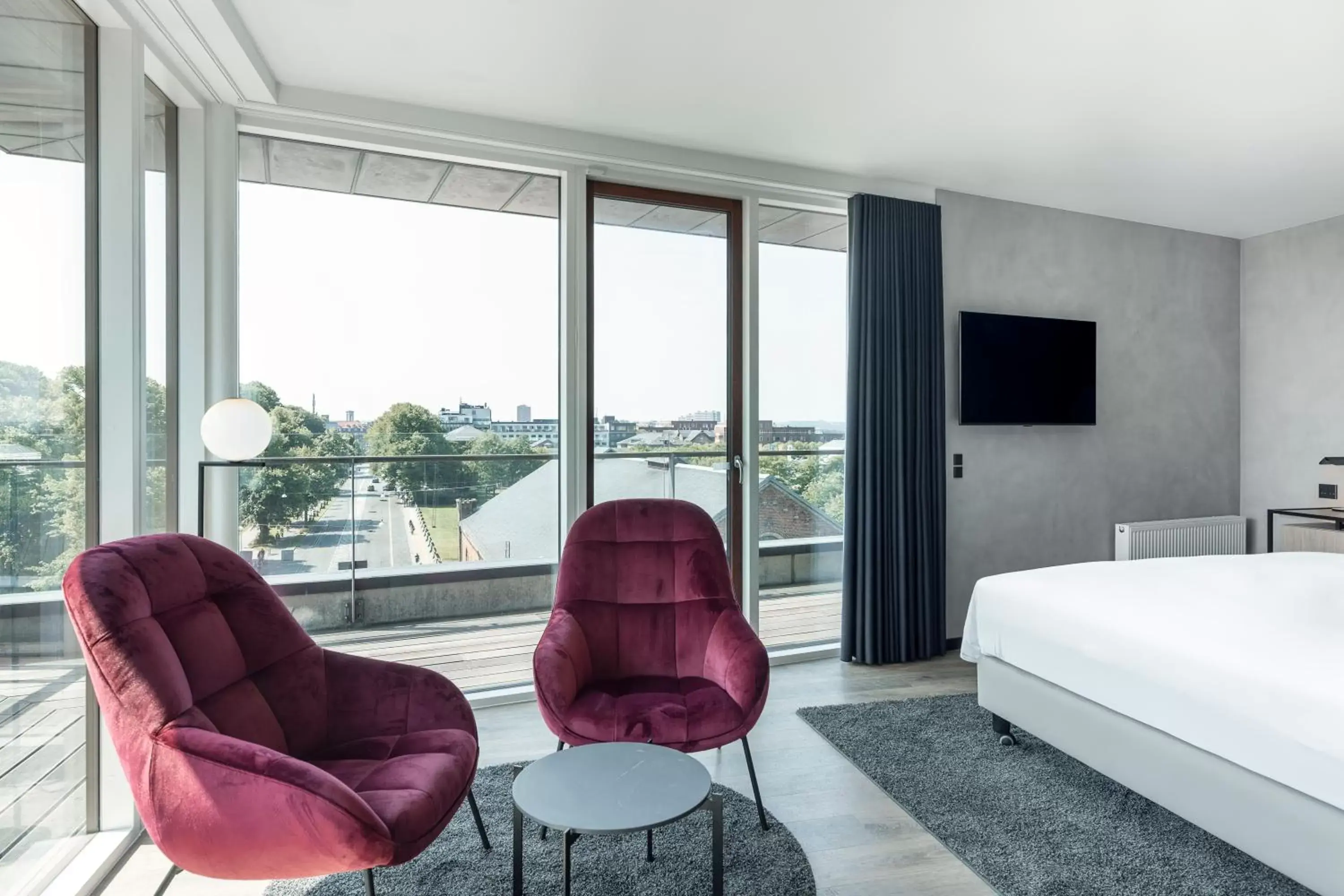 Bed, Seating Area in Radisson RED Aarhus