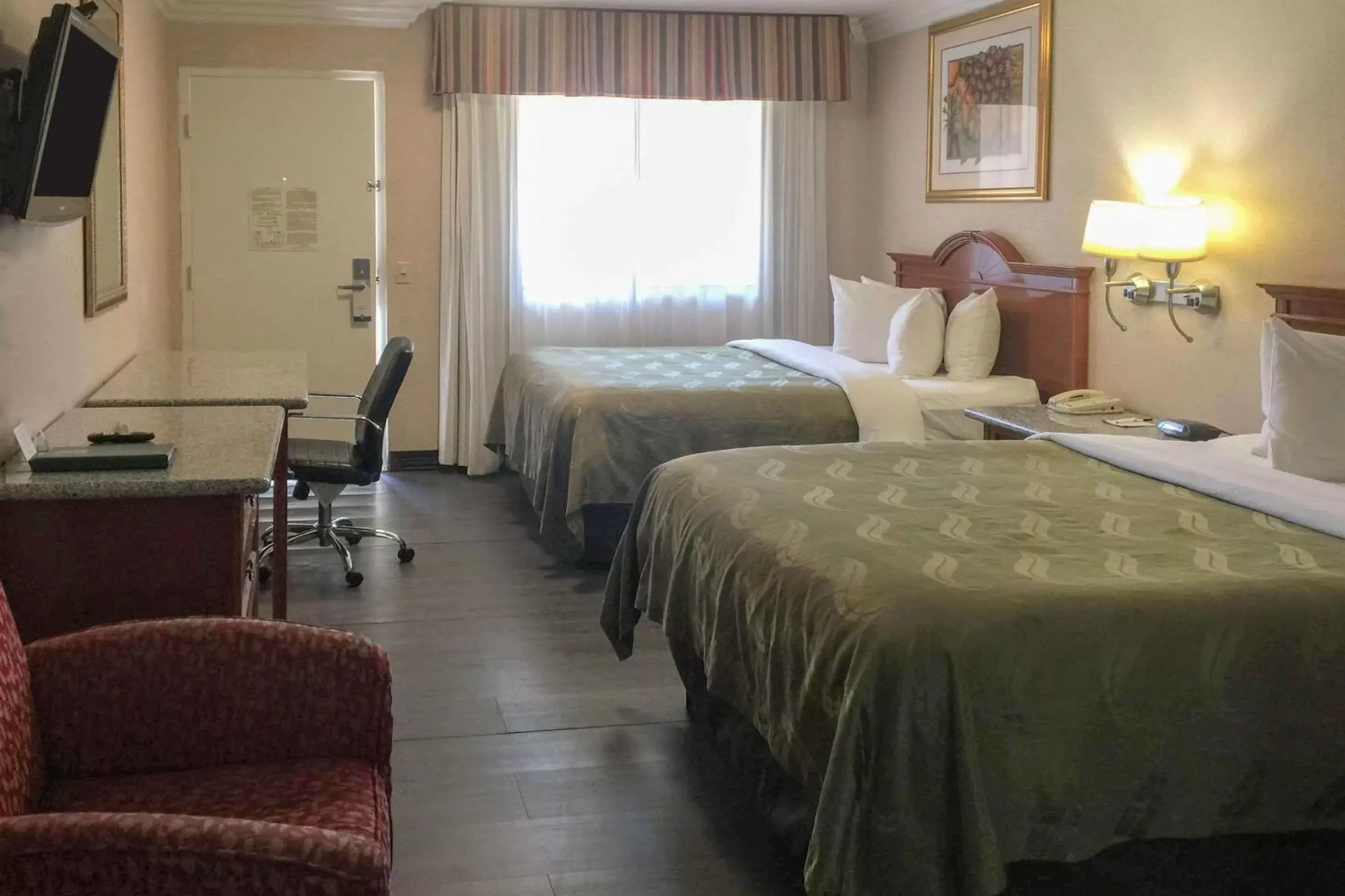 Photo of the whole room, Bed in Quality Inn & Suites Oceanside Near Camp Pendleton