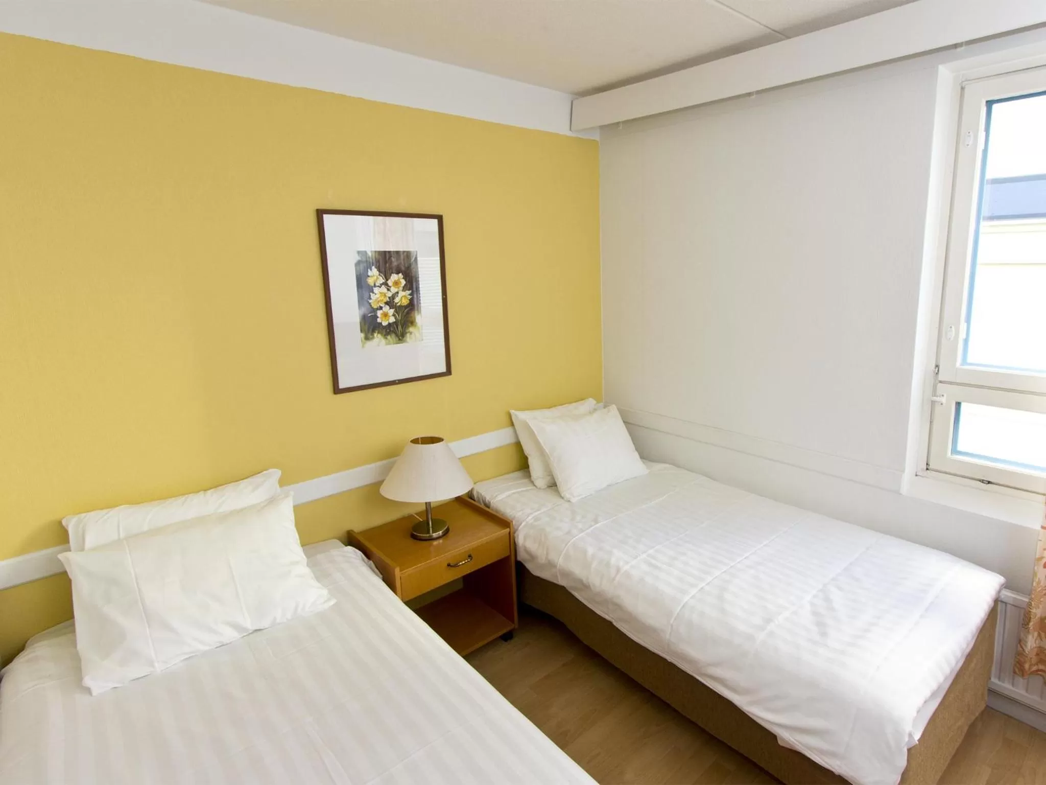 Photo of the whole room, Bed in Kauppahotelli