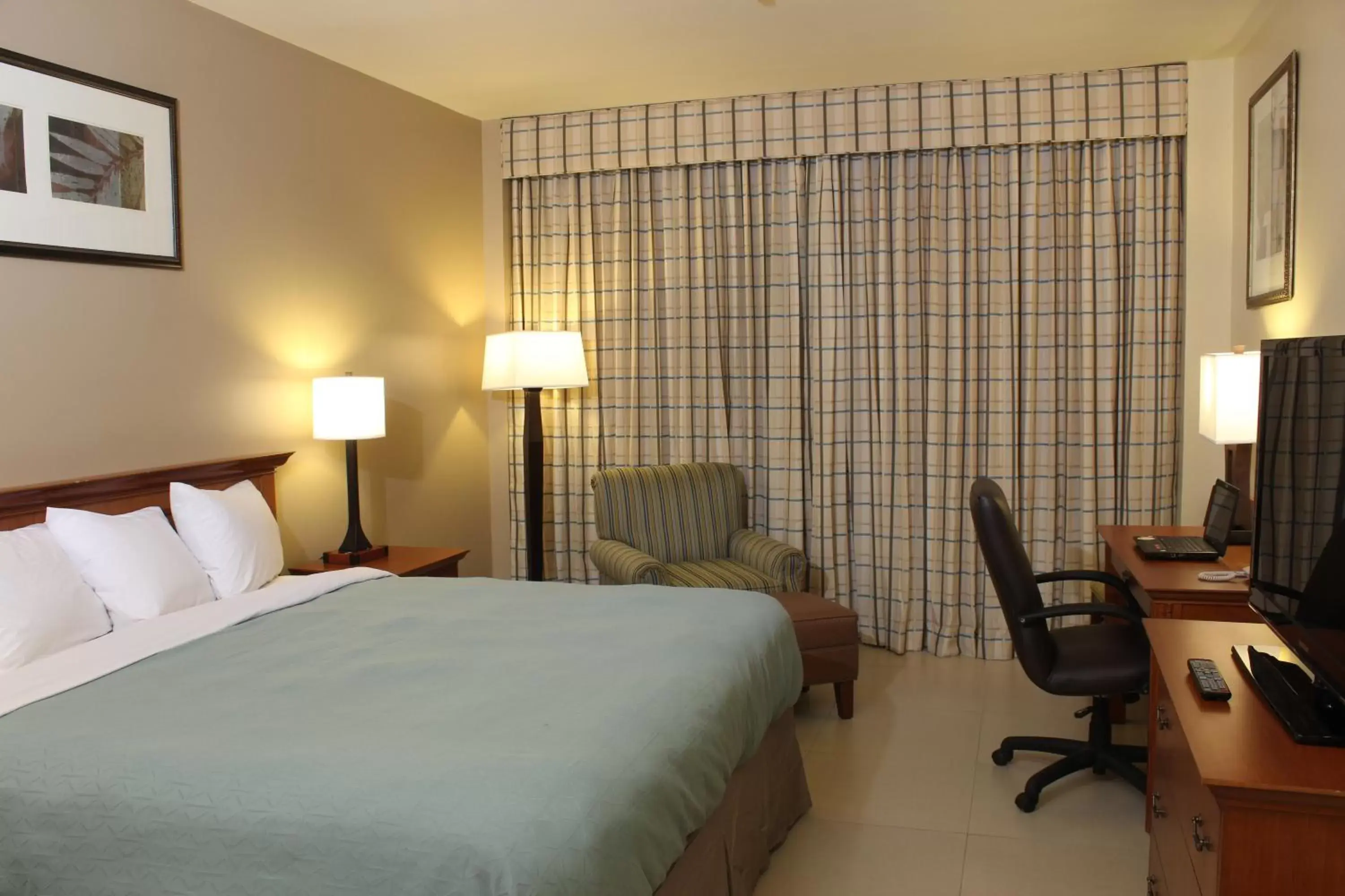 Photo of the whole room, Bed in Radisson Hotel Panama Canal