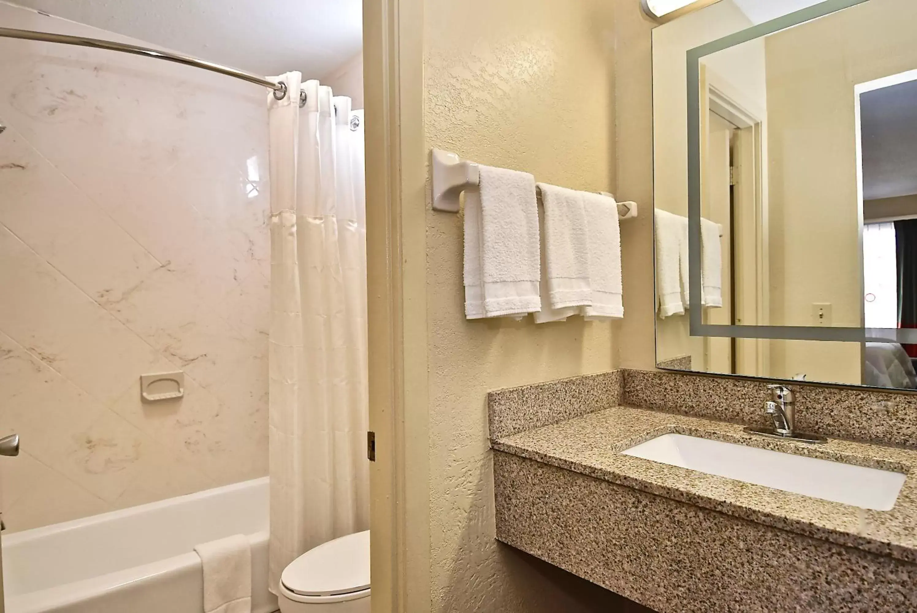Bathroom in SureStay Hotel by Best Western Sarasota Lido Beach
