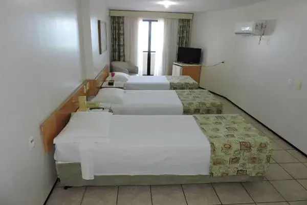 Bed in Iracema Travel