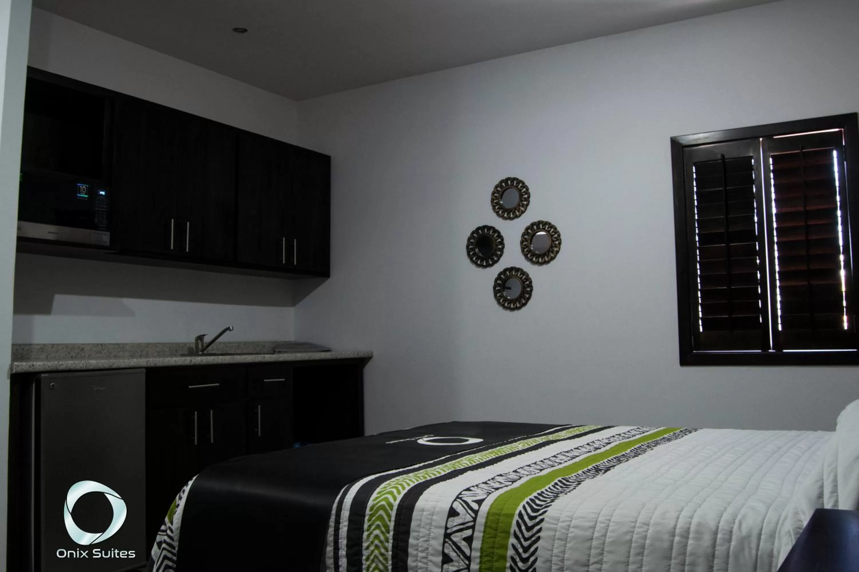 Bed in Hotel Onix Suites