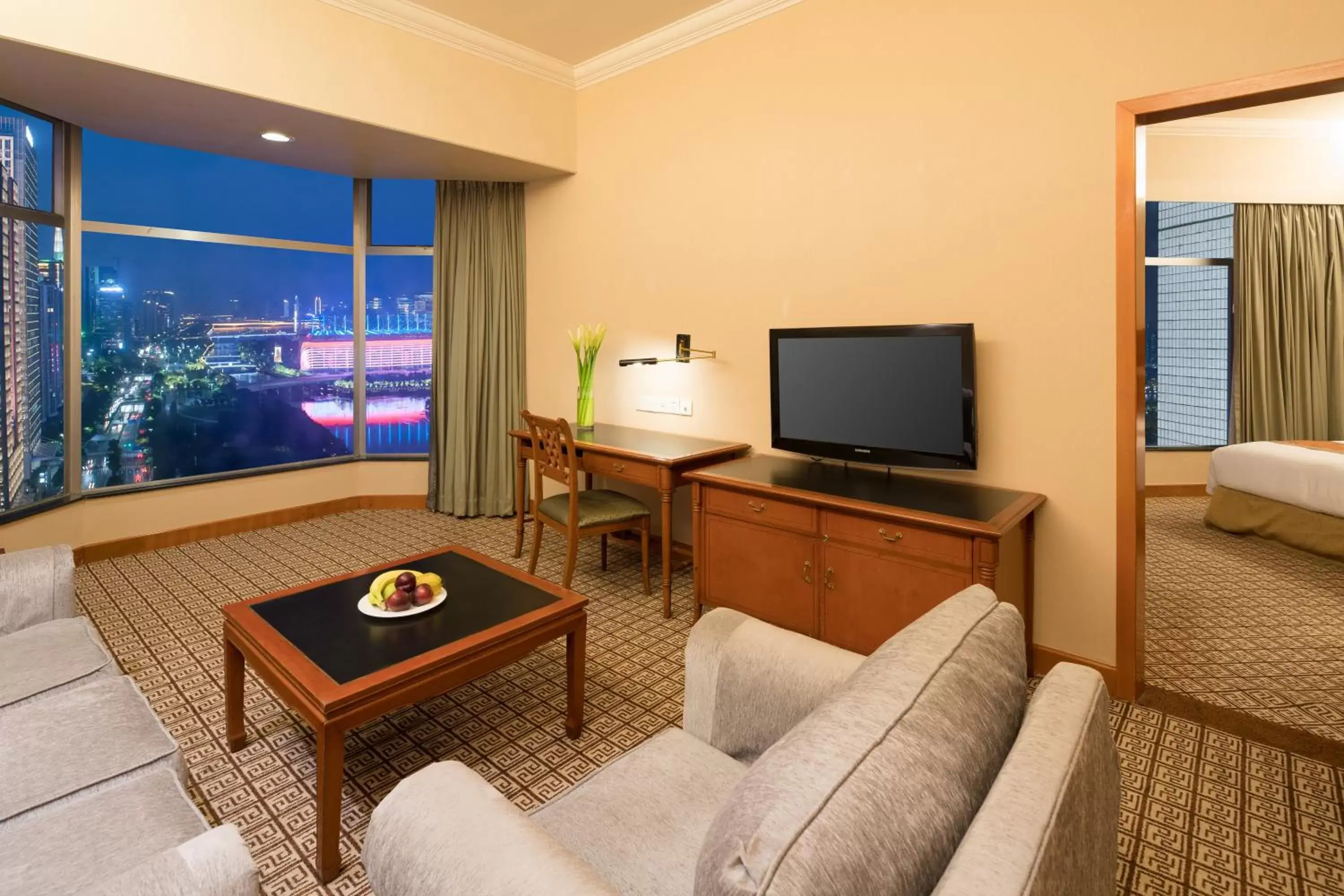 Living room, TV/Entertainment Center in Ramada by Wyndham Pearl Guangzhou-Canton Fair Free Shuttle Bus