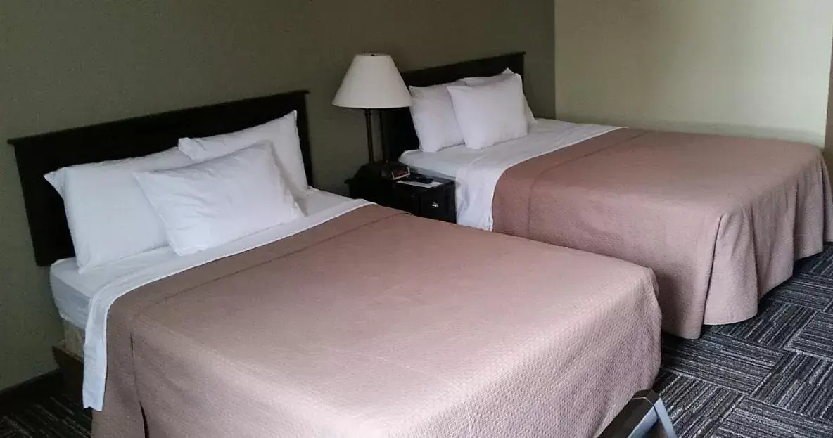 Bed in Sunlac Inn Devils Lake Bed in Sunlac Inn Devils Lake