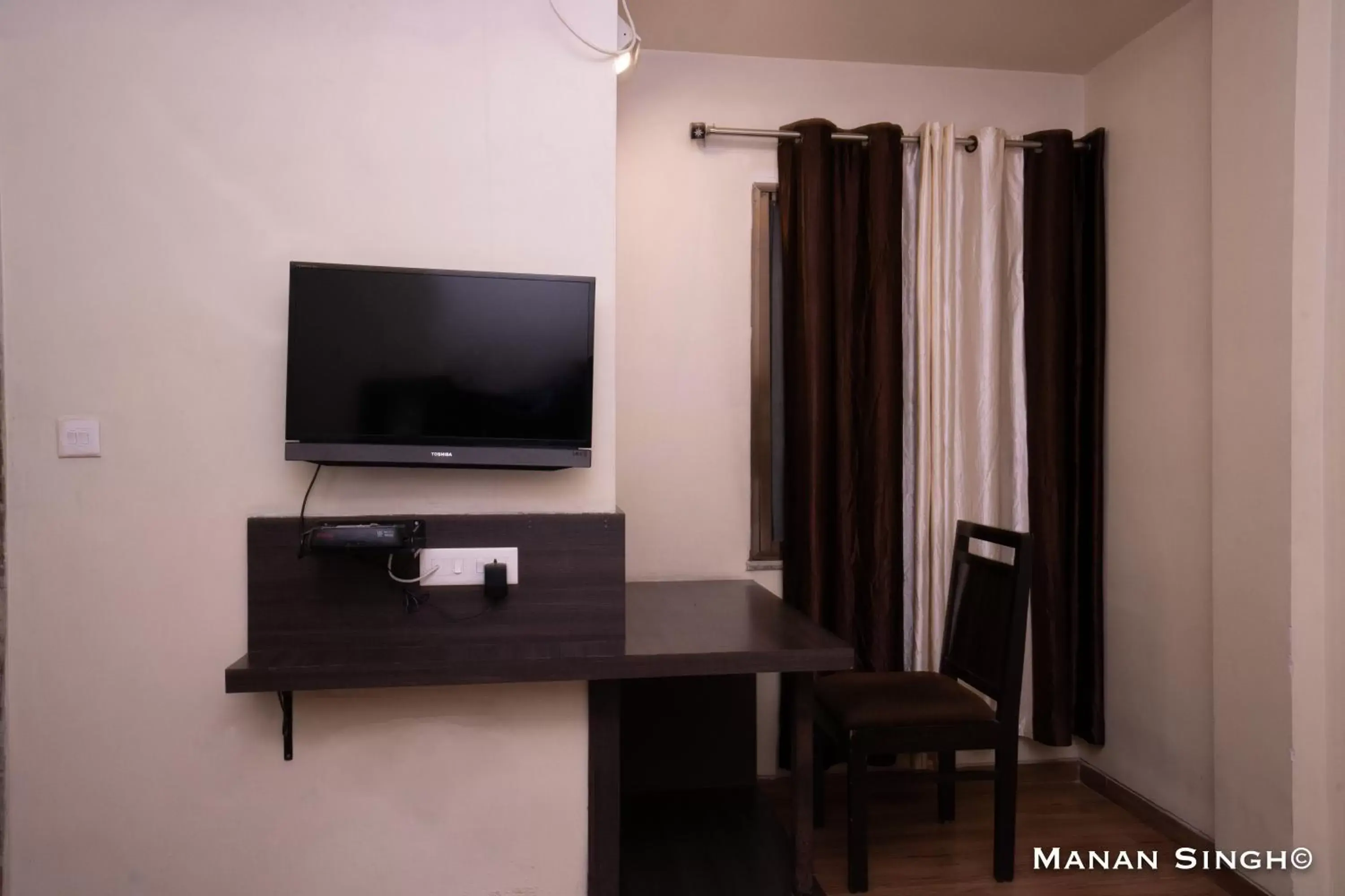 TV and multimedia, TV/Entertainment Center in Hotel Samrat