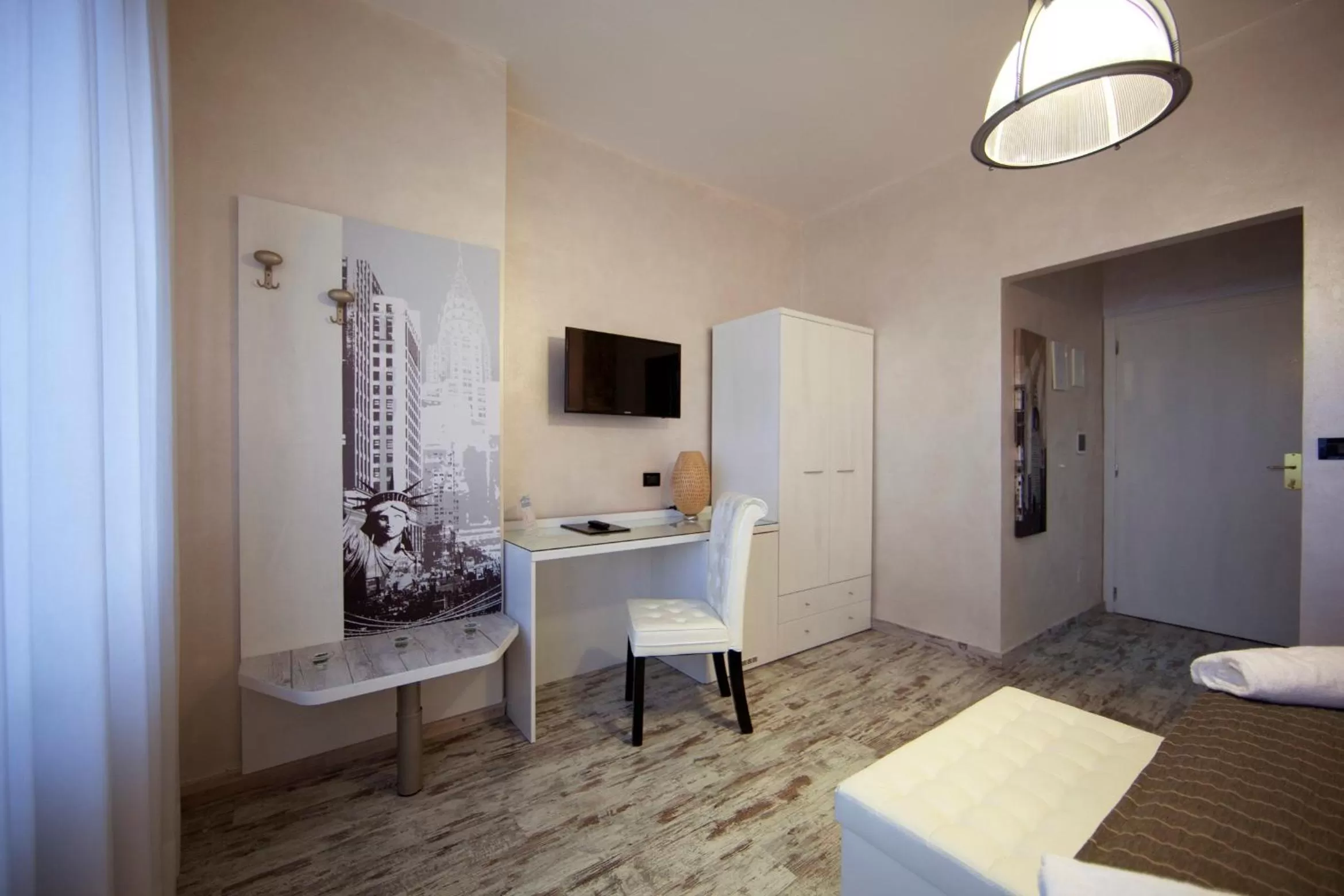 Decorative detail, Bed in Piccolo Hotel Allamano