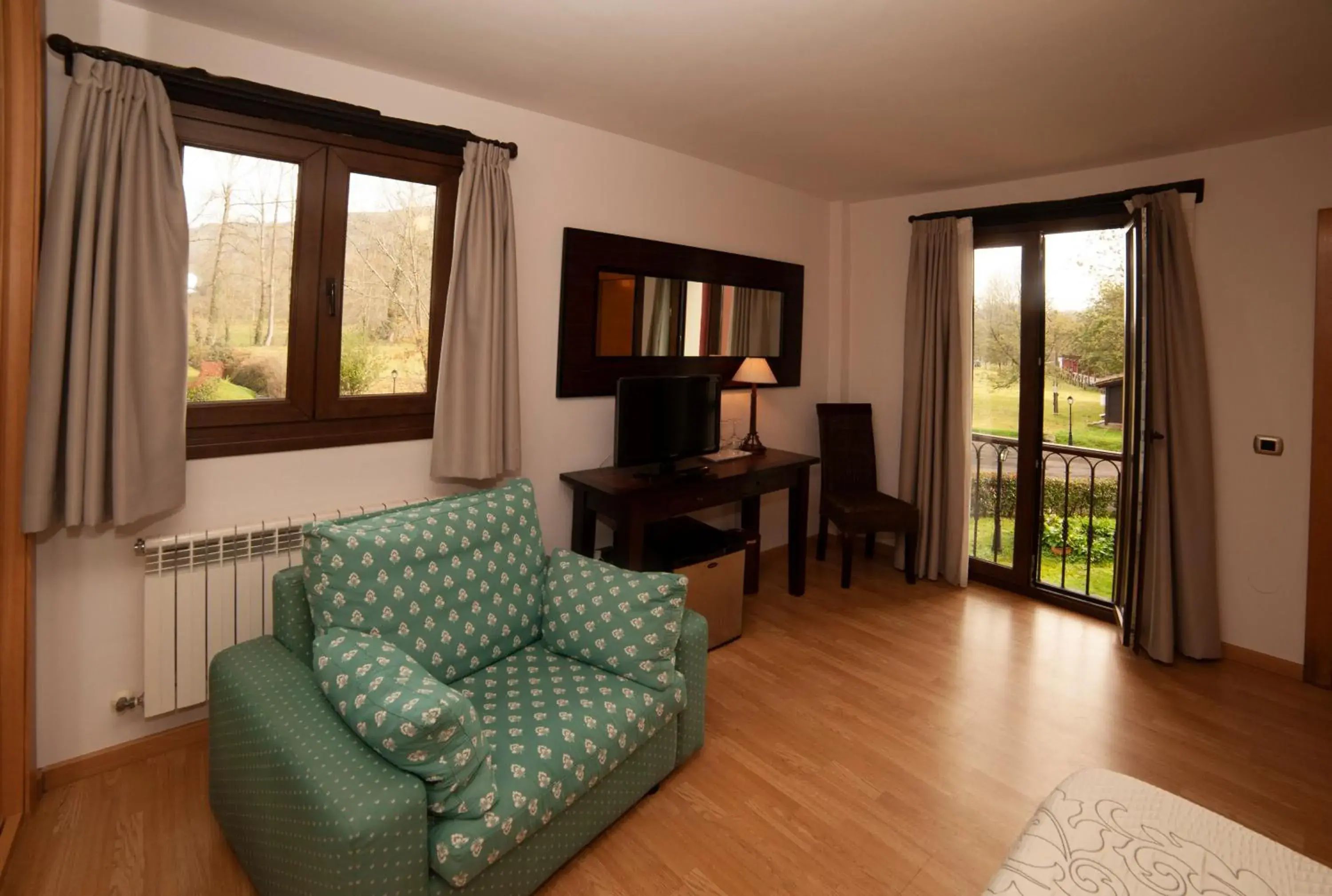 Bedroom, Seating Area in Hotel Rural Casa de Campo