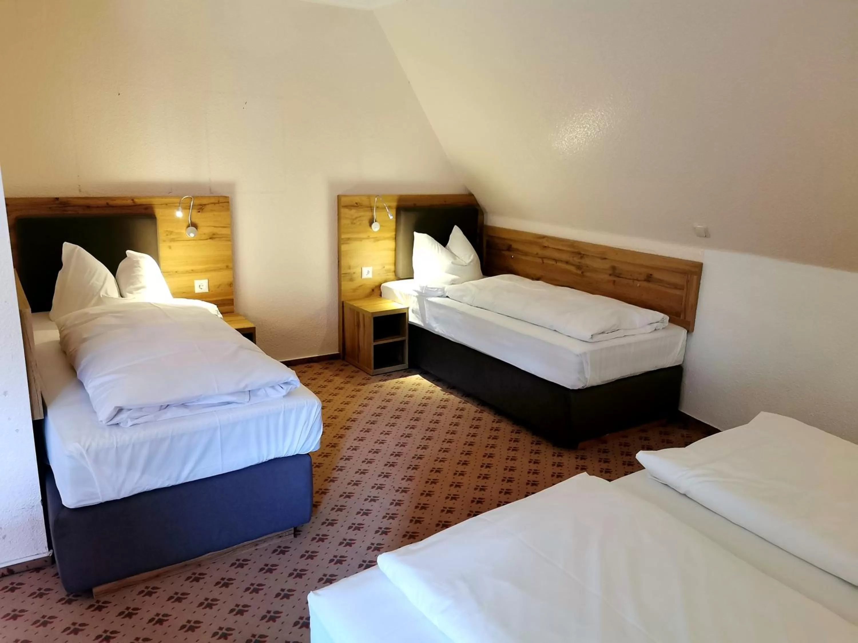 Photo of the whole room, Bed in Heidehotel Soltauer Hof