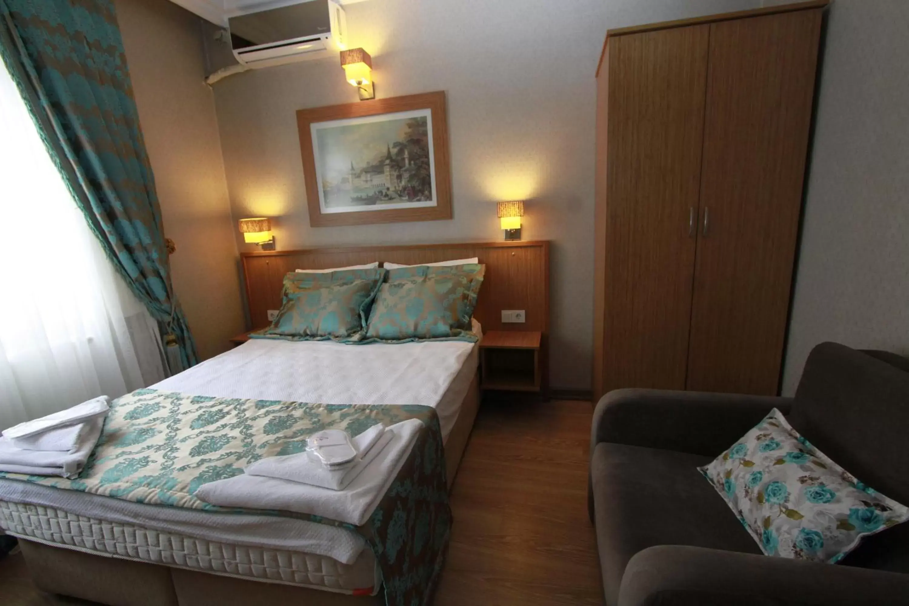 Photo of the whole room, Bed in Agora Boutique Hotel & Bistro