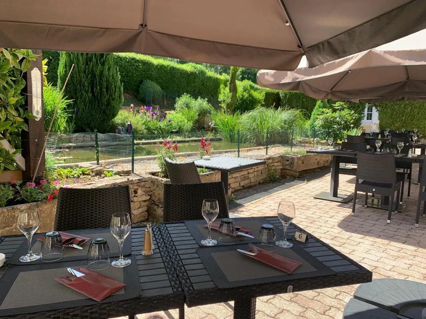 Patio in Logis Hôtel Restaurant Le Moulin de la Coudre