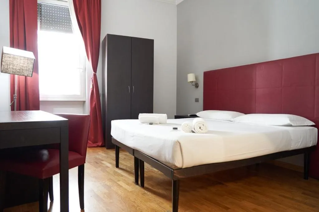 Bed in Target Inn Rooms