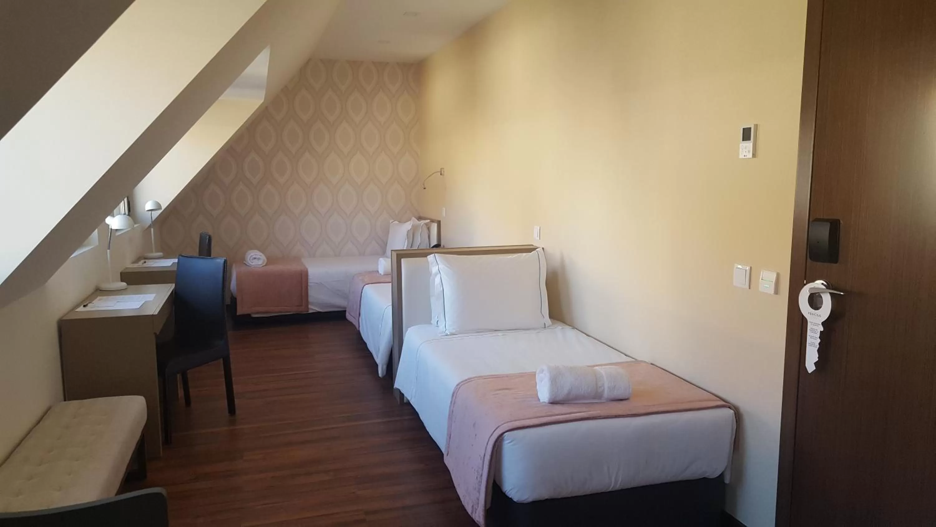 Bed in Fenicius Charme Hotel