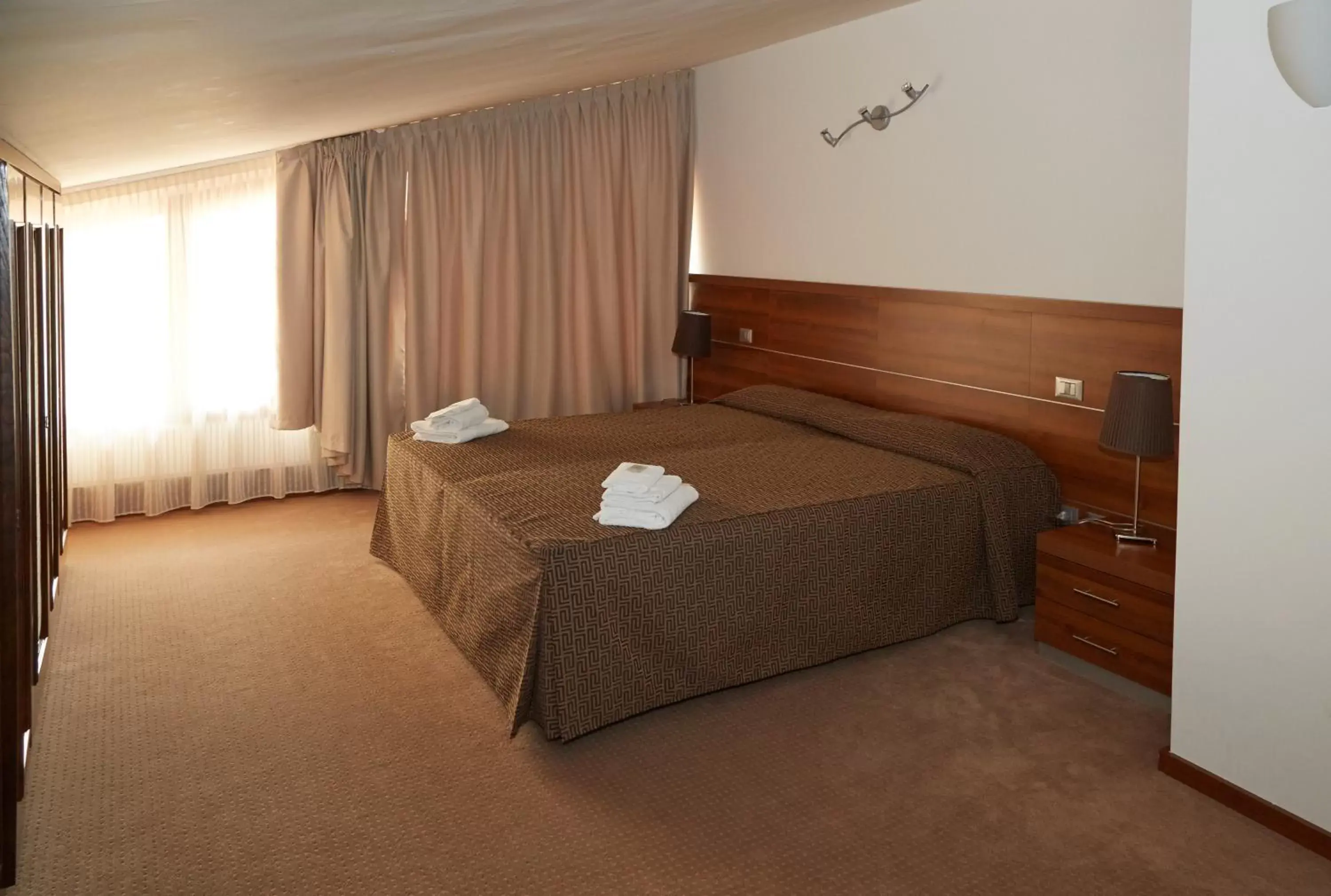 Bed in GREEN GARDEN Resort - Smart Hotel