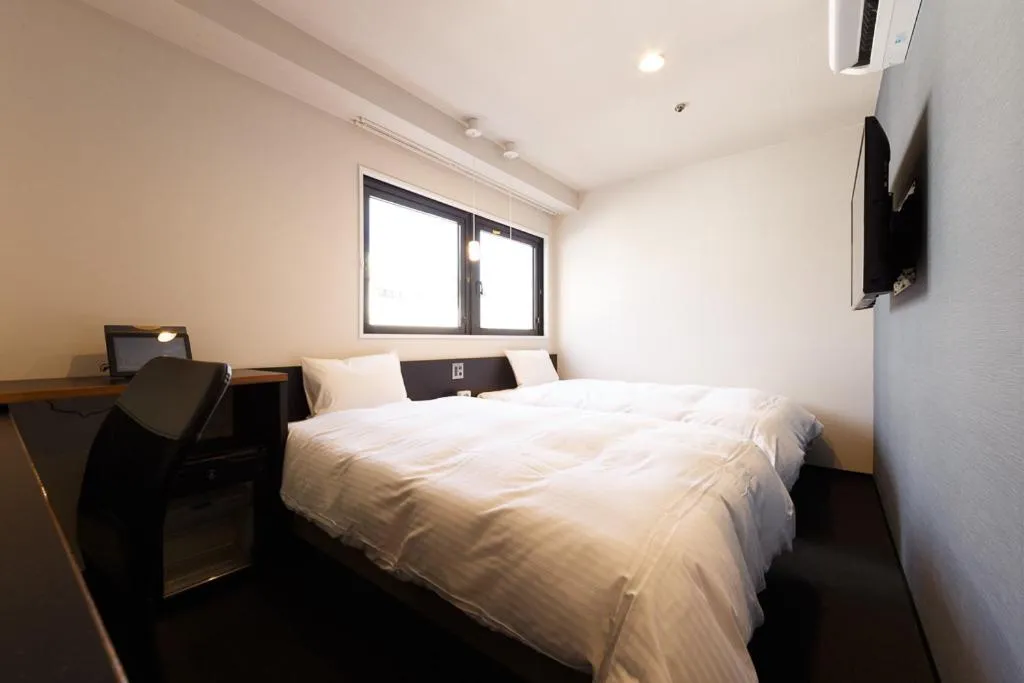 Photo of the whole room, Bed in Hotel Citio Shizuoka