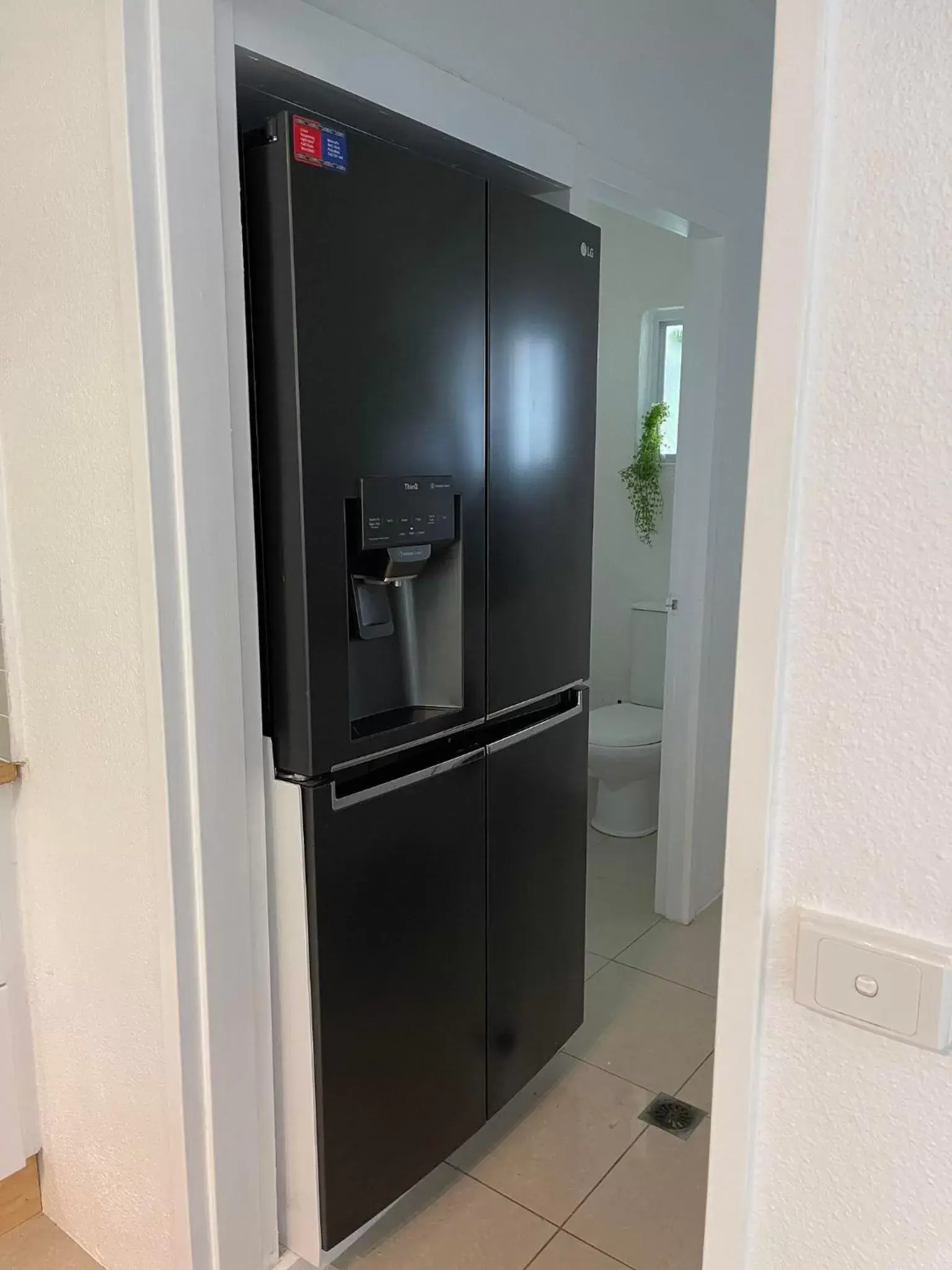 Kitchen or kitchenette, Bathroom in Reef Resort Villas Port Douglas