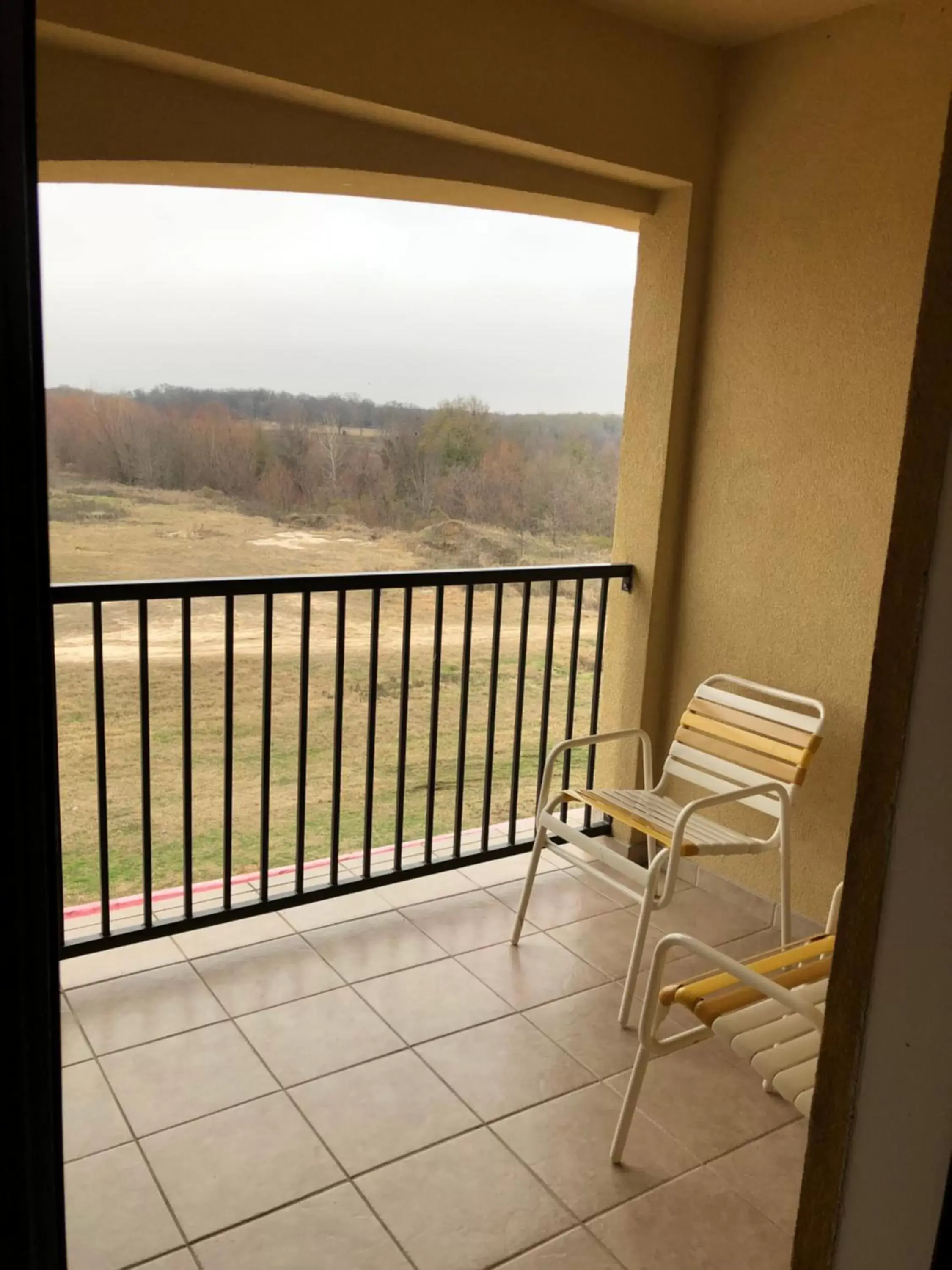 Balcony/Terrace in Americas Best Value Inn - Gun Barrel City