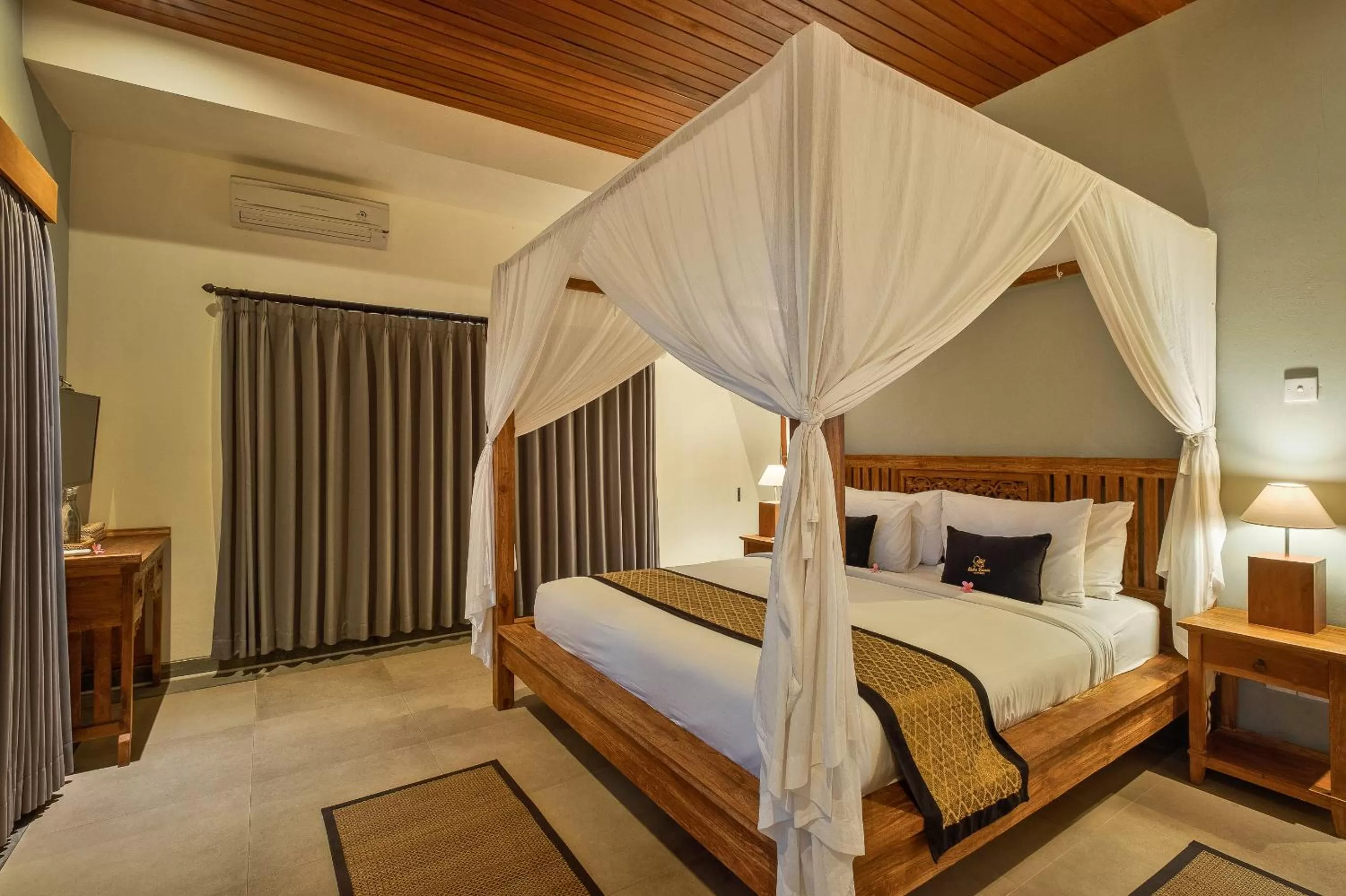 Bed in Kubu Rama Ubud Cottage