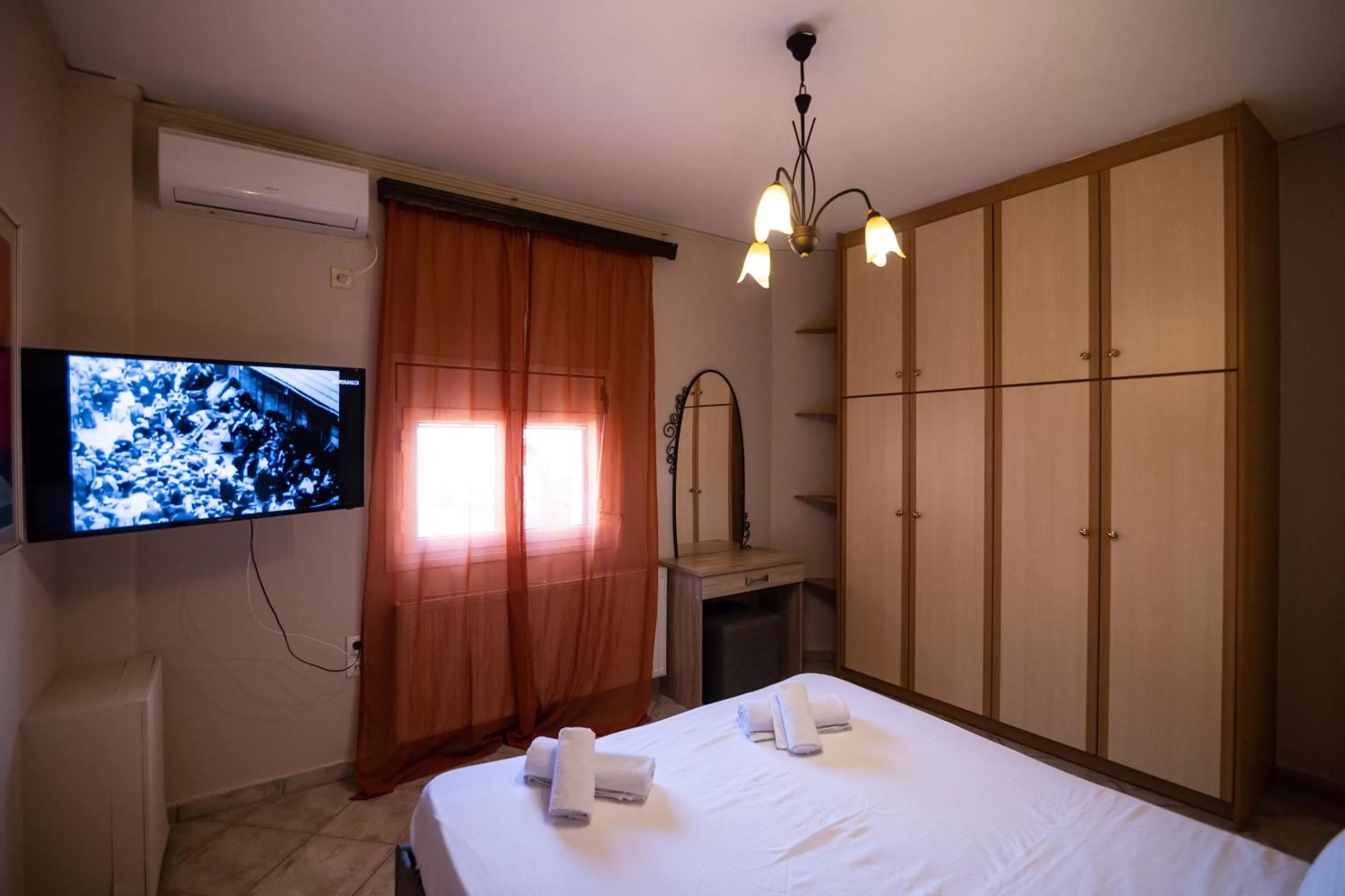 Bed in Votsalakia Hotel & Luxury Apartments