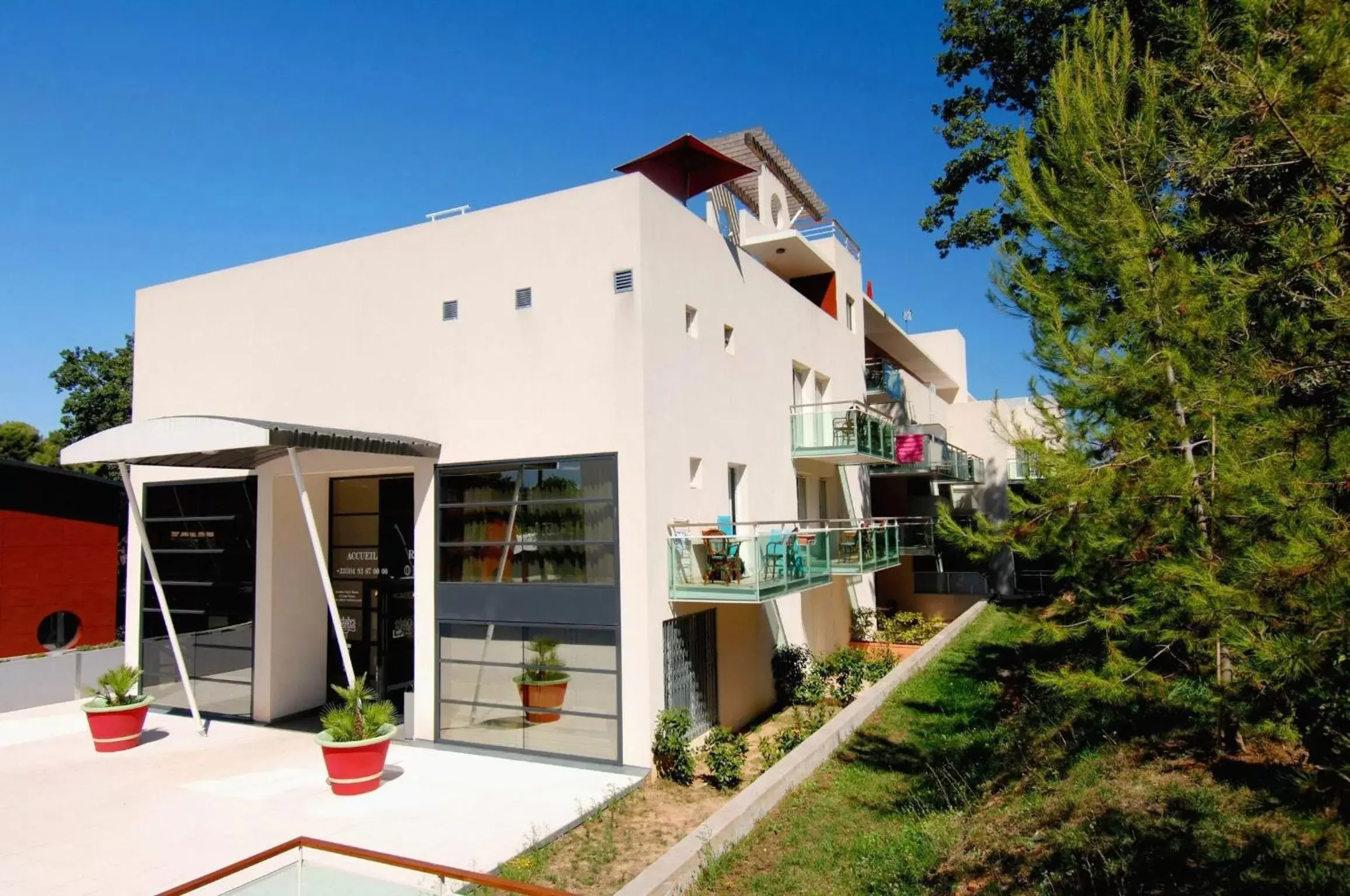 Property building in Appart Hotel Odalys City Antibes Olympe Property building in Appart Hotel Odalys City Antibes Olympe
