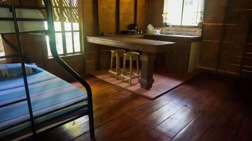 Bed, Dining Area in Hospedaje La Naciente