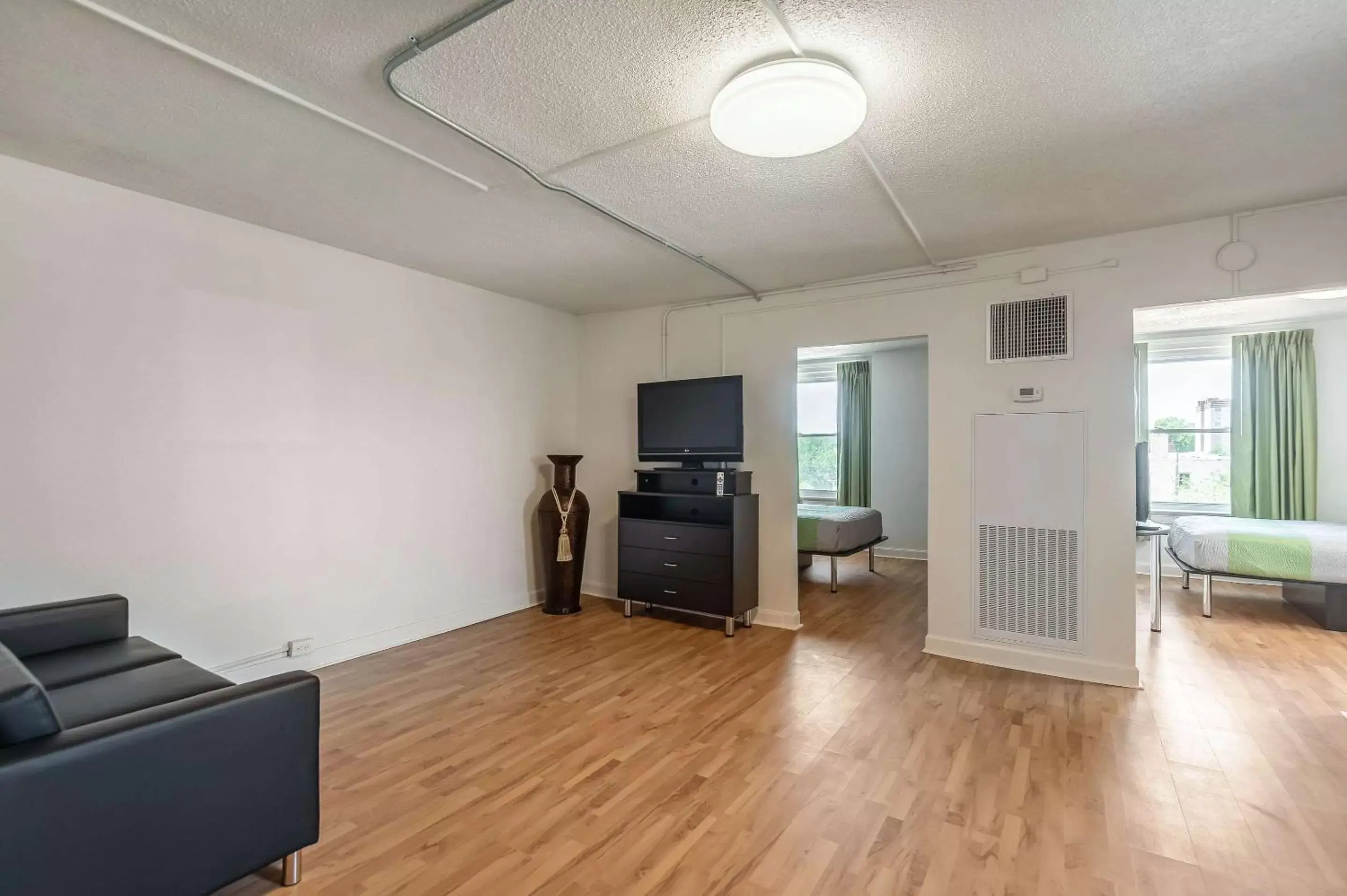 Photo of the whole room, TV/Entertainment Center in Quality Inn & Suites Kansas City Downtown