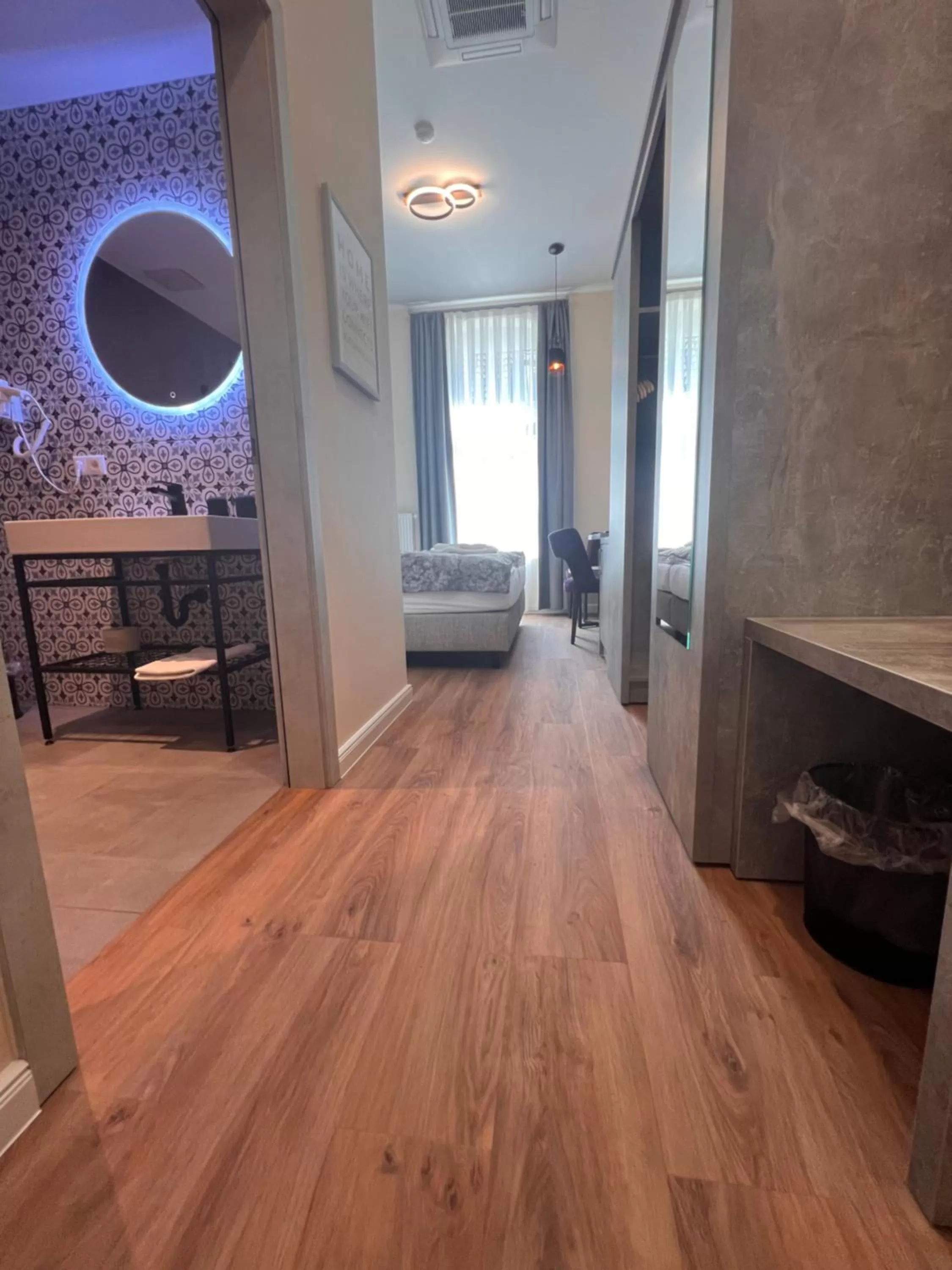 Bathroom, Bed in Novel Hotel