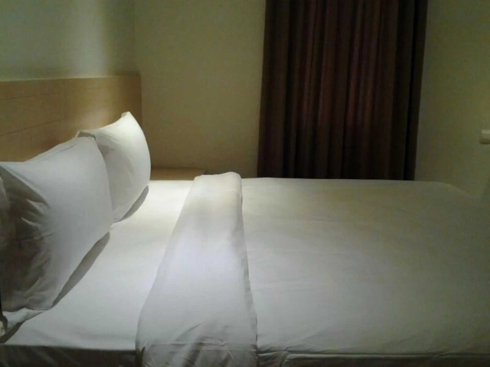 Bed in Zodiak Asia Afrika by KAGUM Hotels