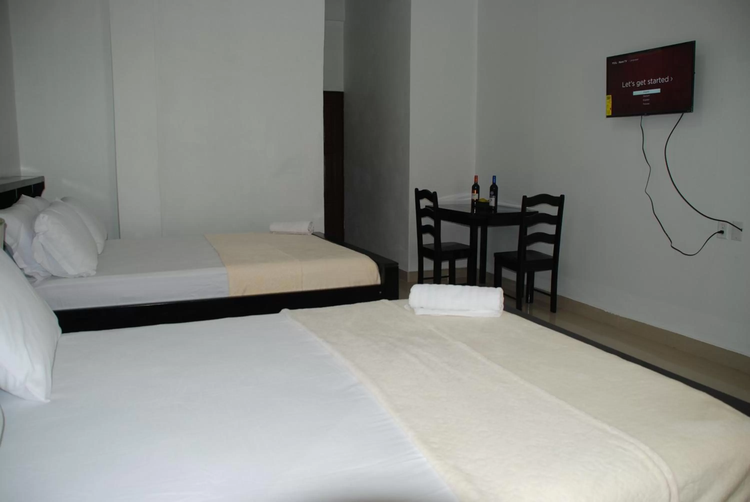 Bed in Hotel Coastalbay 2 & Golf Cart Rental