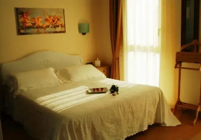 Decorative detail, Bed in Hotel Piccolo Principe