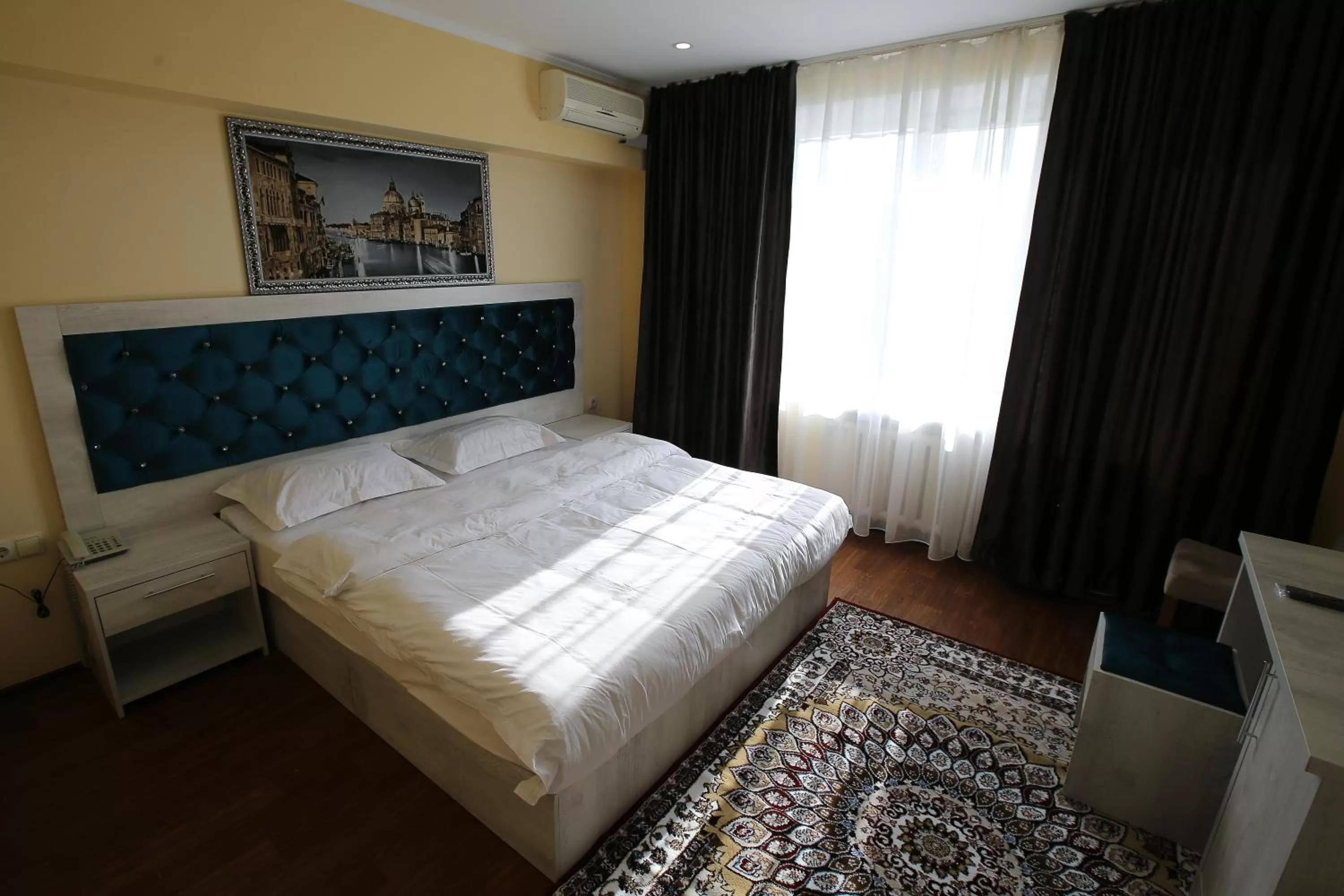 Bed in Altai Business Hotel